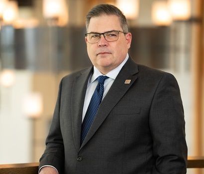 Headshot of Tim Coetzee, President & Chief Executive Officer