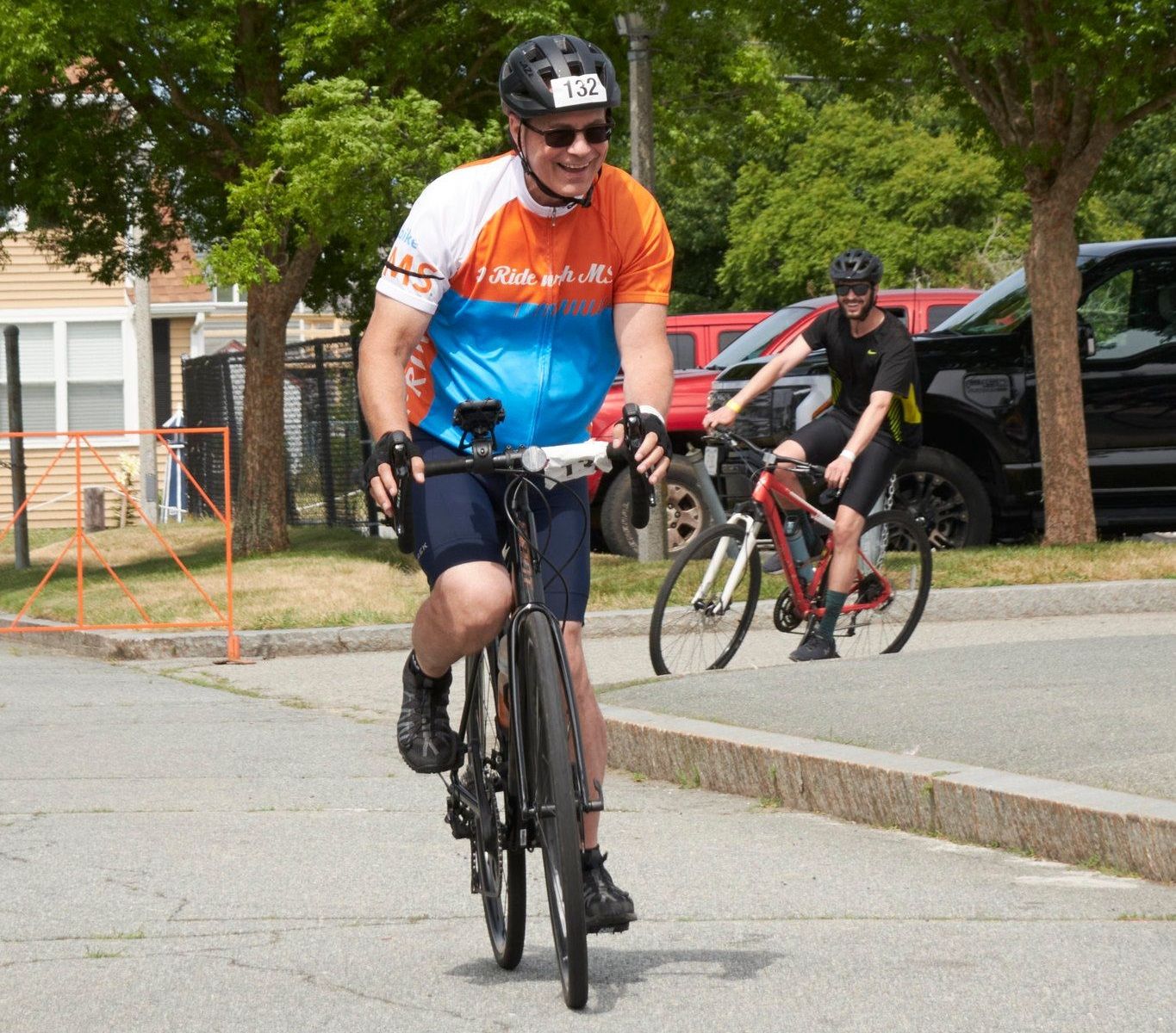 A person wearing an "I Ride With MS" jersey participates in a Bike MS event.