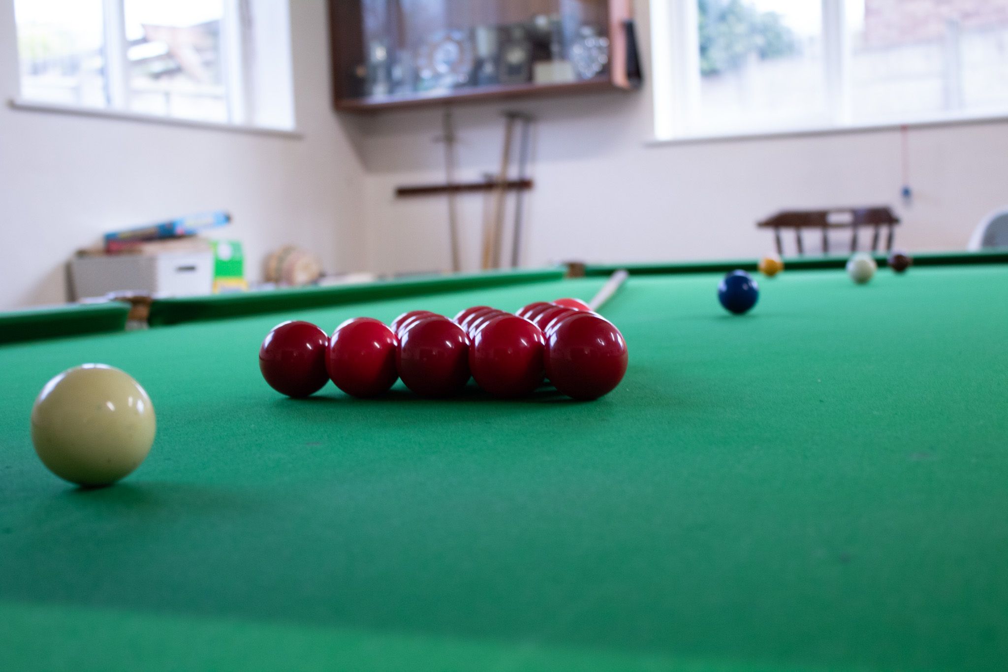 Snooker table set up for a frame.
