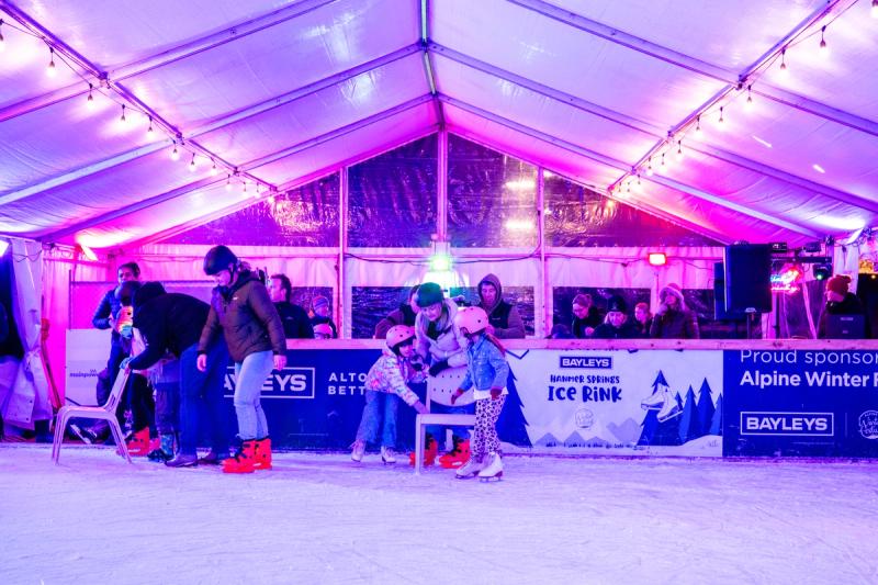 Family enjoying ice skating at MainPower alpine winter festival