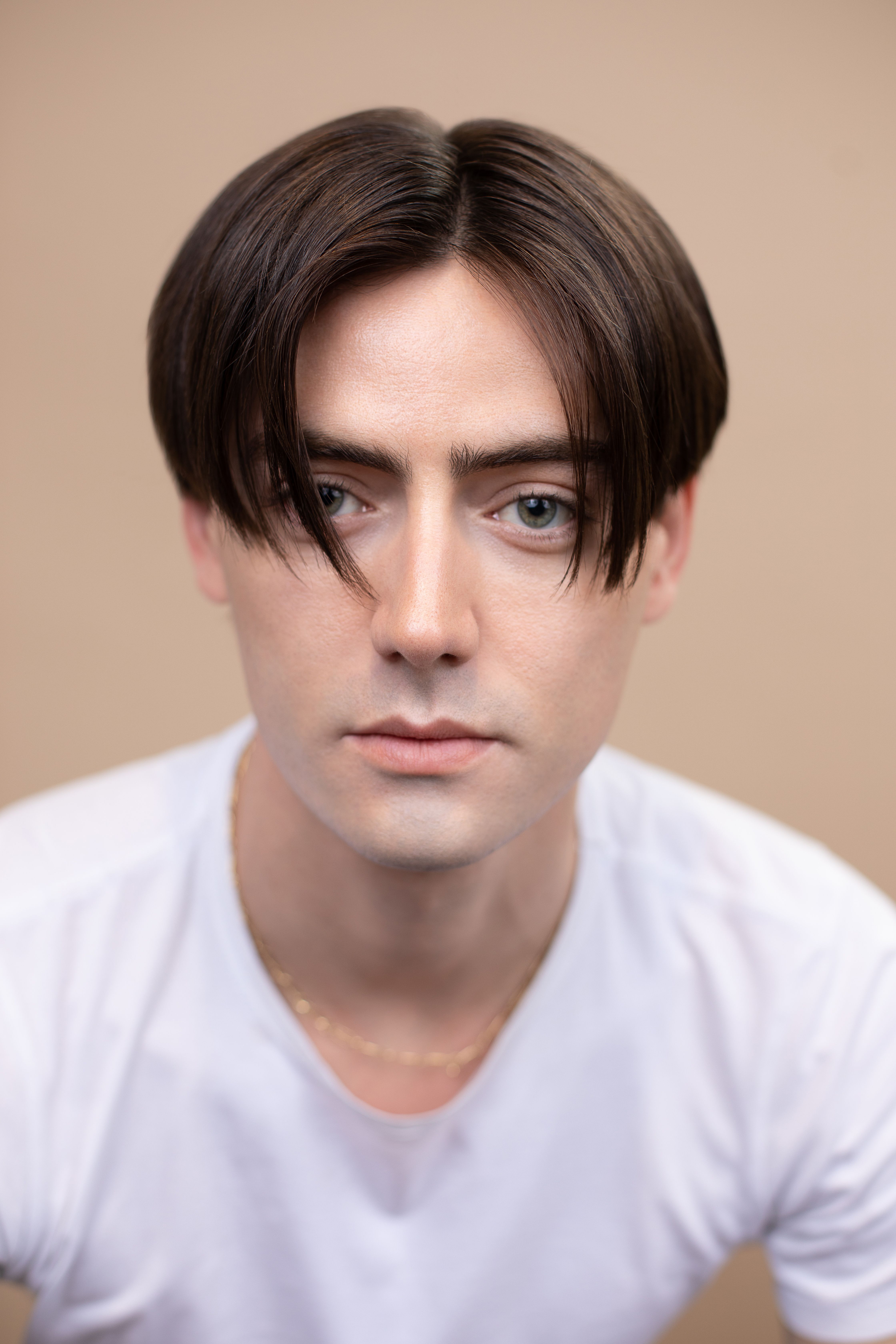 Short medium curtain cut hairstyle by Fabio Scalia