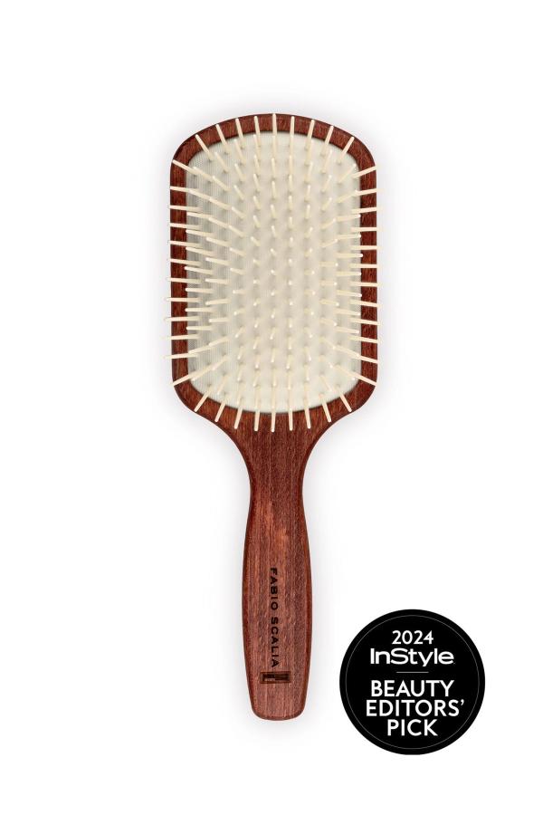 La Claudia paddle hair brush with white bristles and wood handle