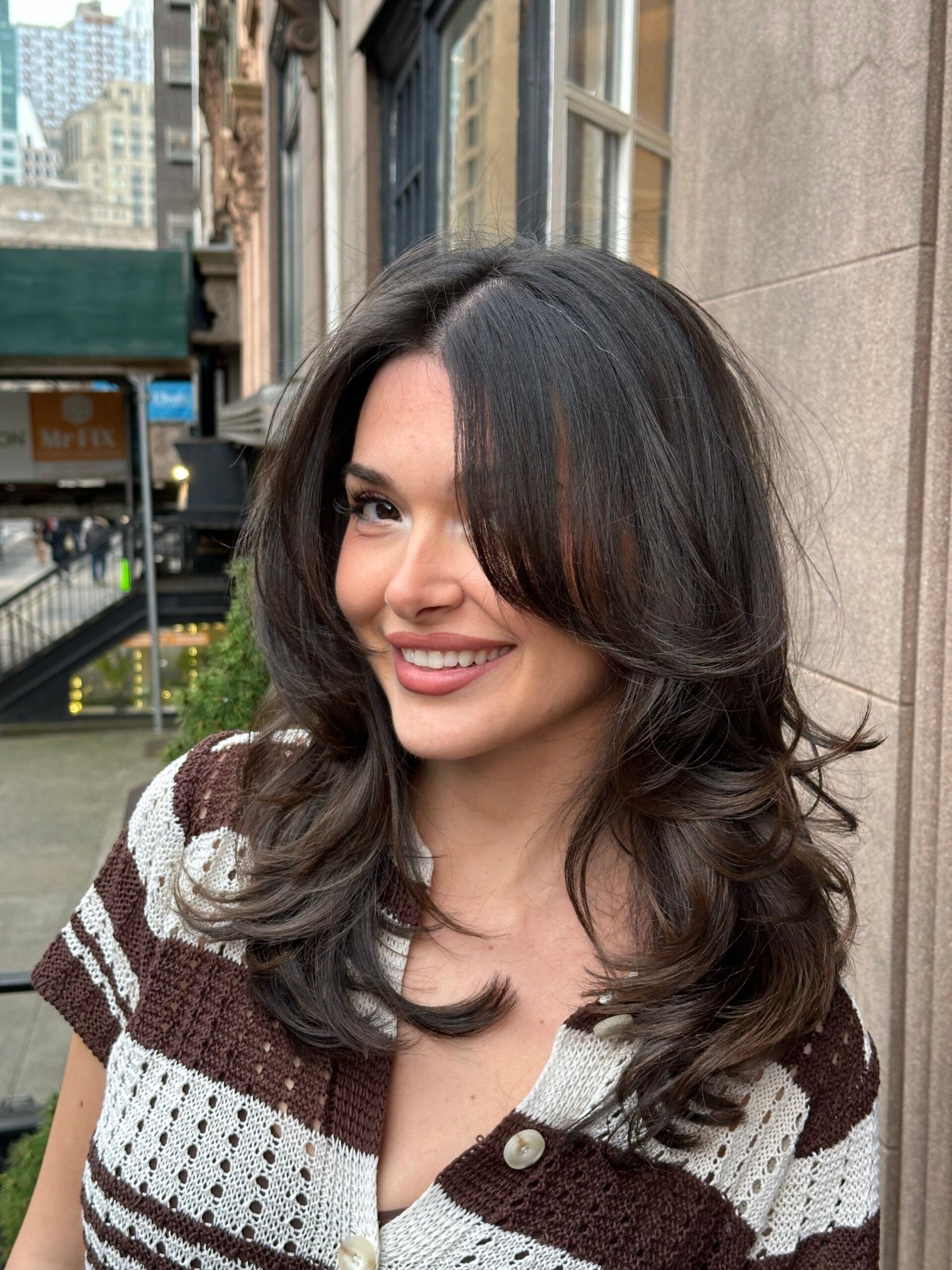 Picture of a woman with a butterfly haircut