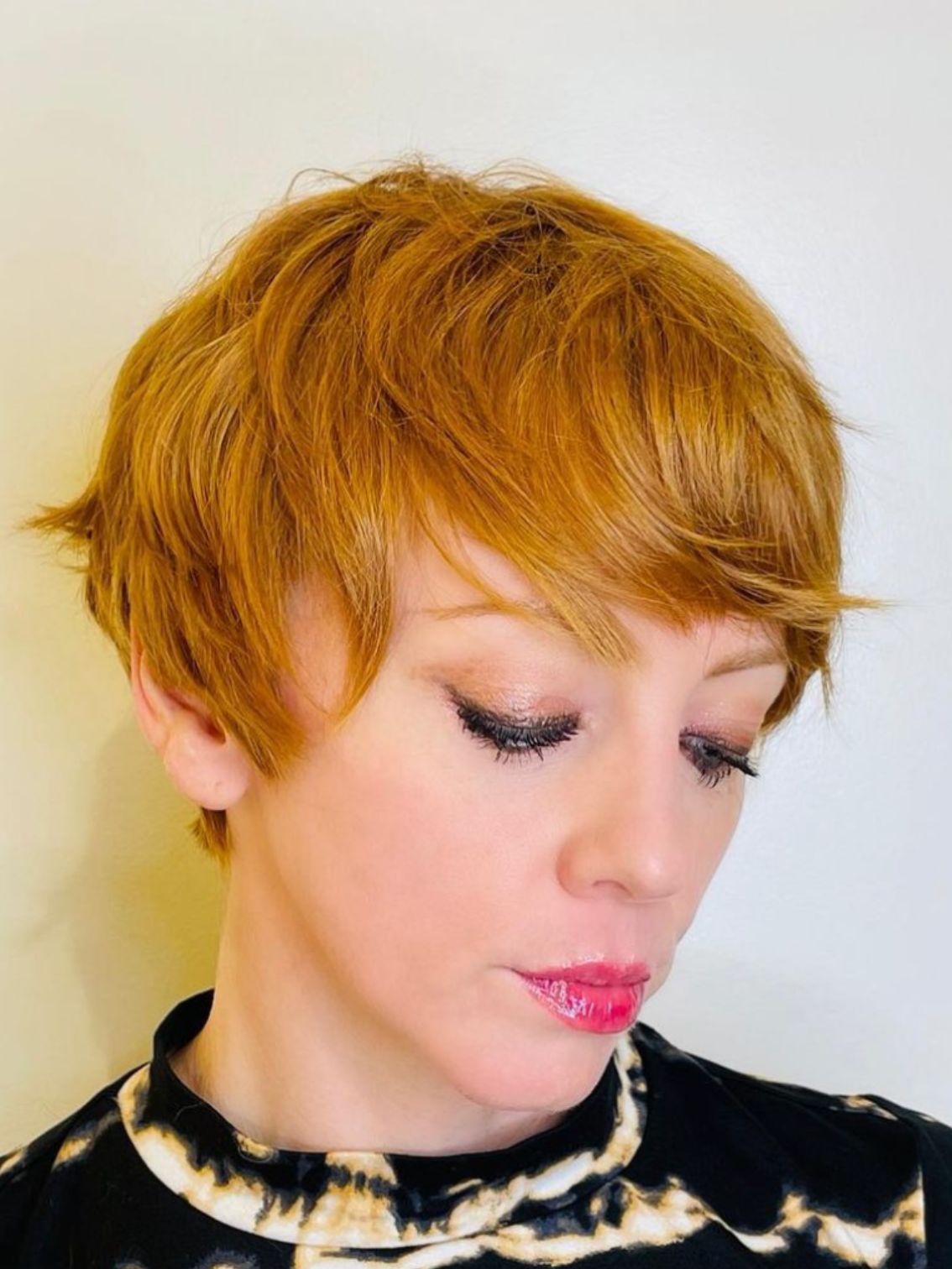 model with peachy blond copper hair color