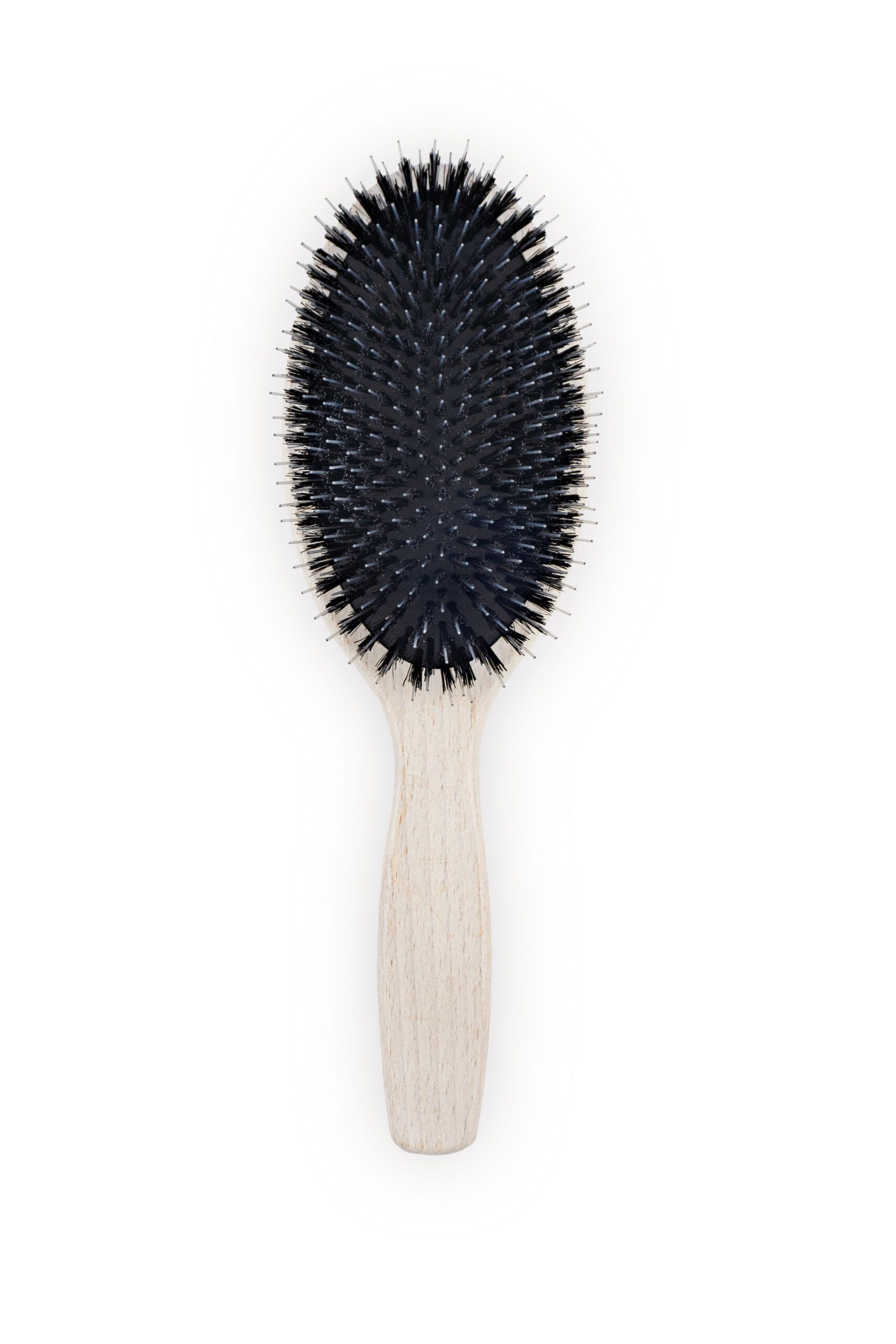 La Chiara oval cushion hair brush with black bristles and light wood handle