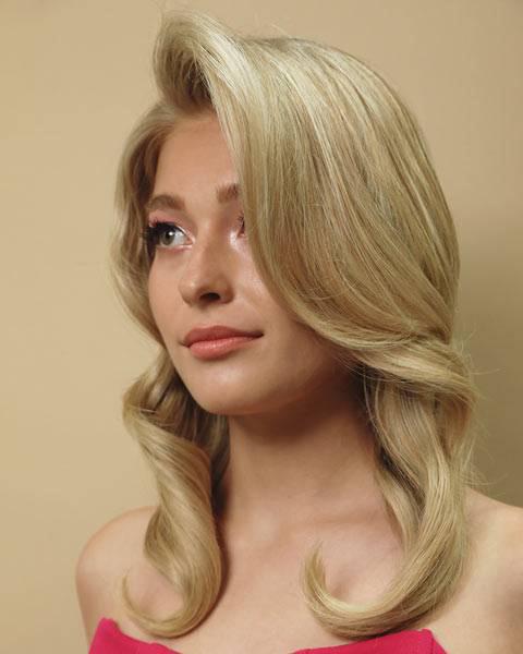 Long blowout blonde hairstyle by Fabio Scalia