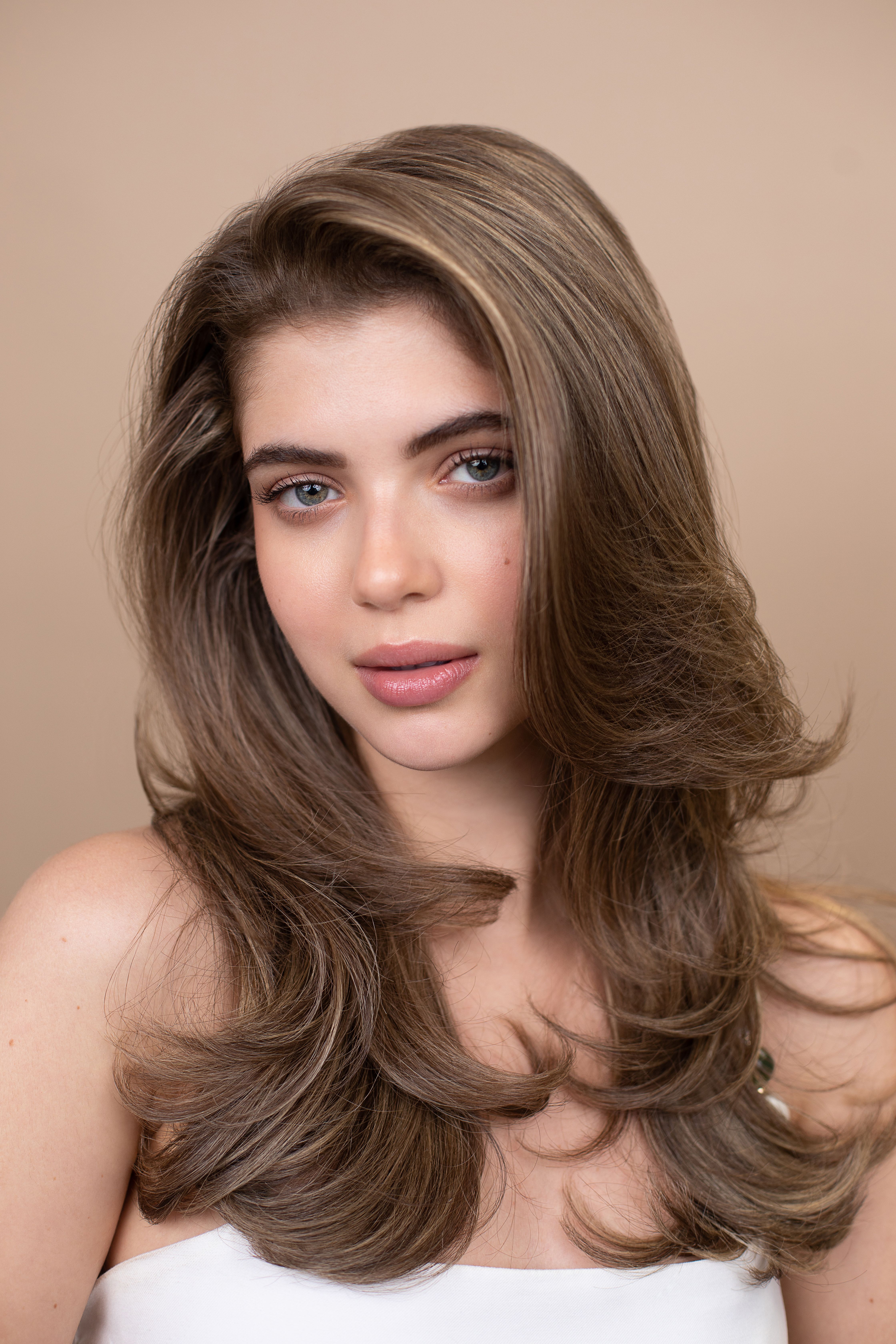 Long polished high shine hairstyle by Fabio Scalia
