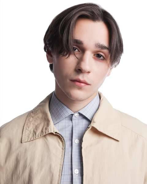 Medium curtain cut center part hairstyle by Fabio Scalia