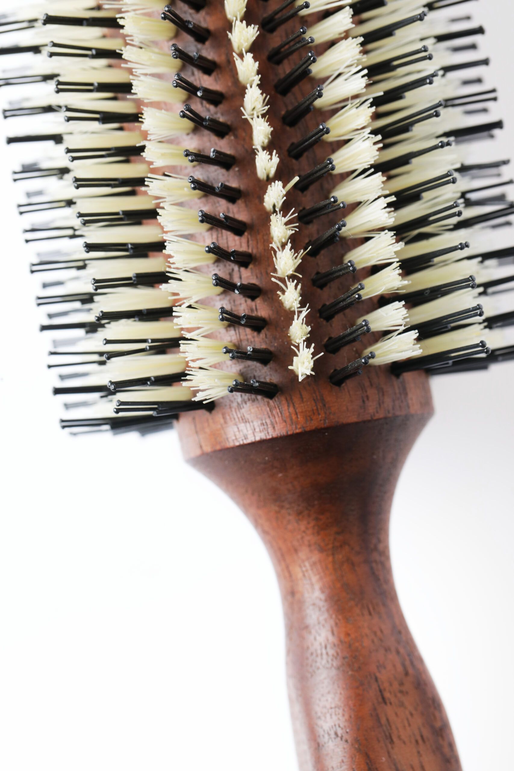 Close-up of La Mora Double Bristle Brush showing natural boar bristles and French nylon pins