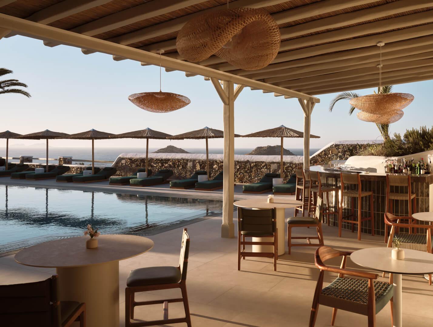 A covered terrace with woven pendant lights and a bar, looking out over a row of sunbeds and umbrellas to the sea at dusk.
