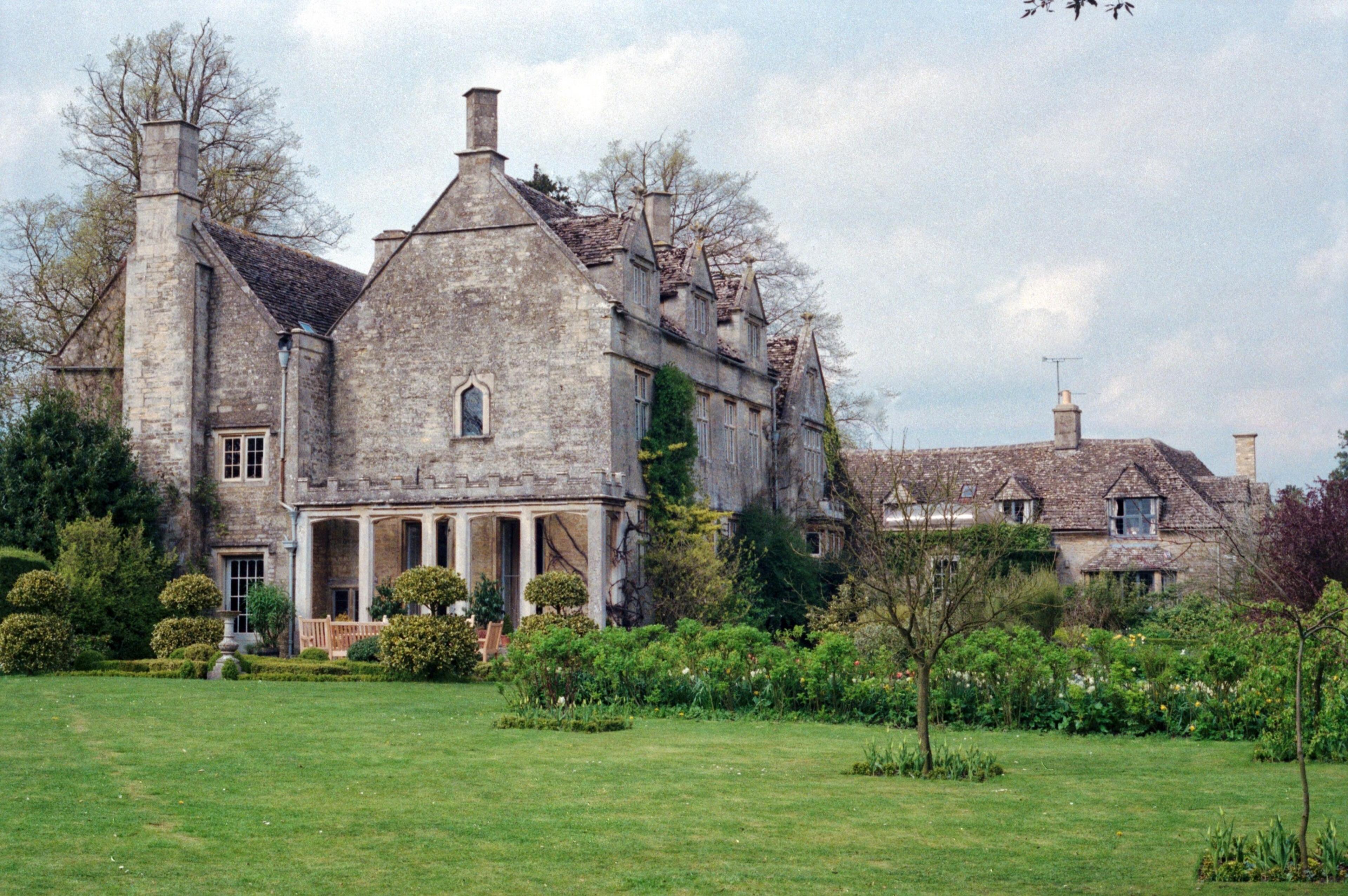 The stone house seen across its garden
