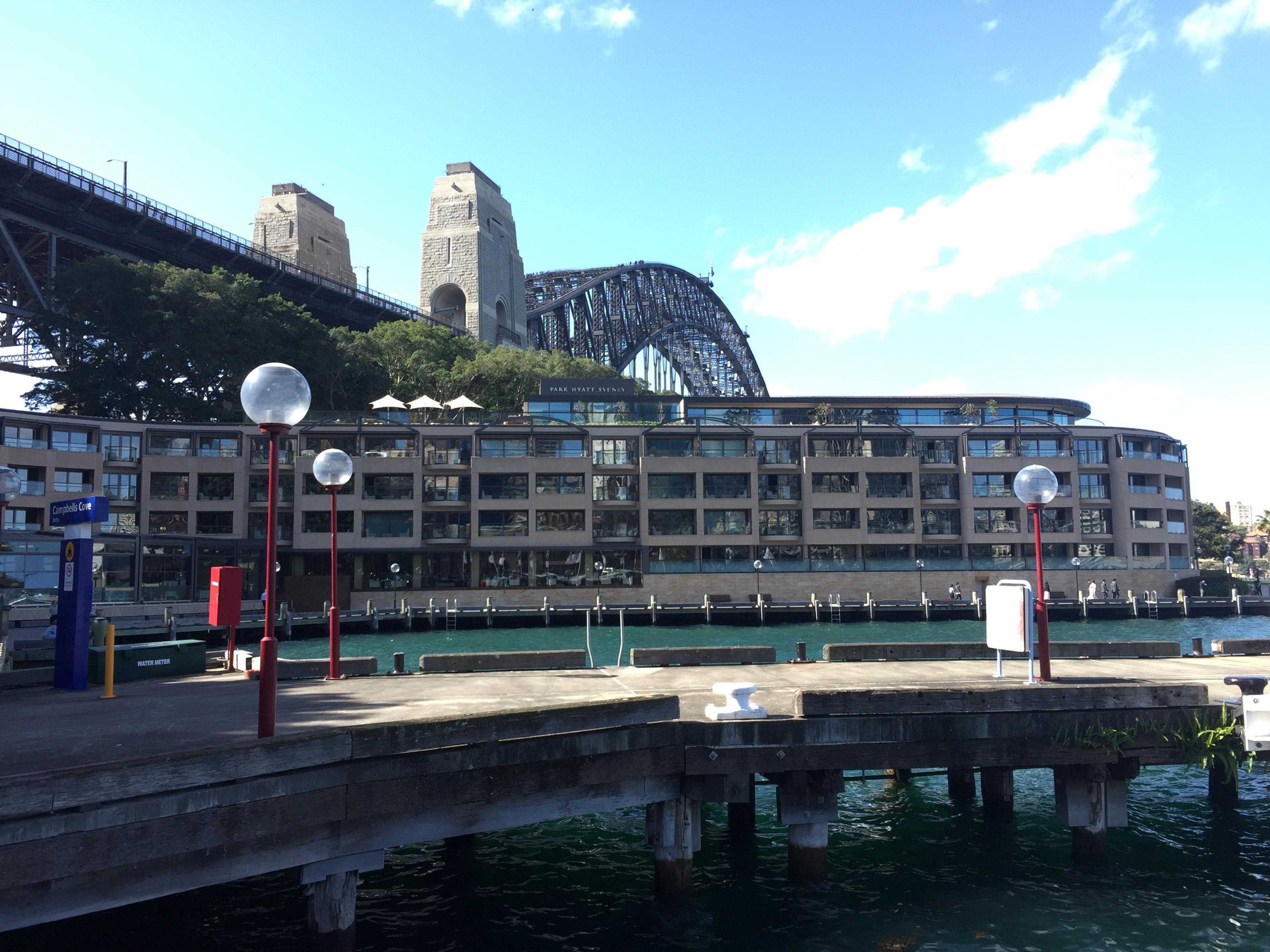 The low hotel on the water at Campbell's Cove, beneath the southern end of the Harbour Bridge