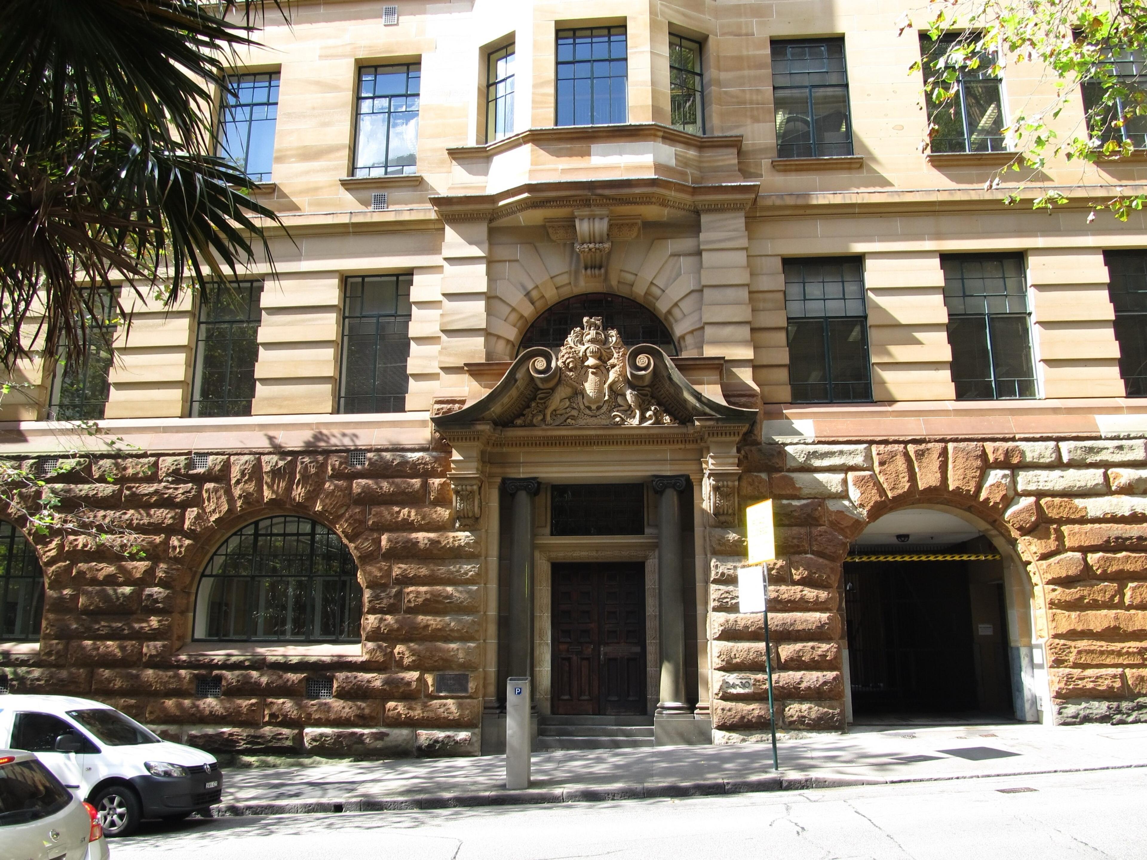 A carved stone doorway on the sandstone facade