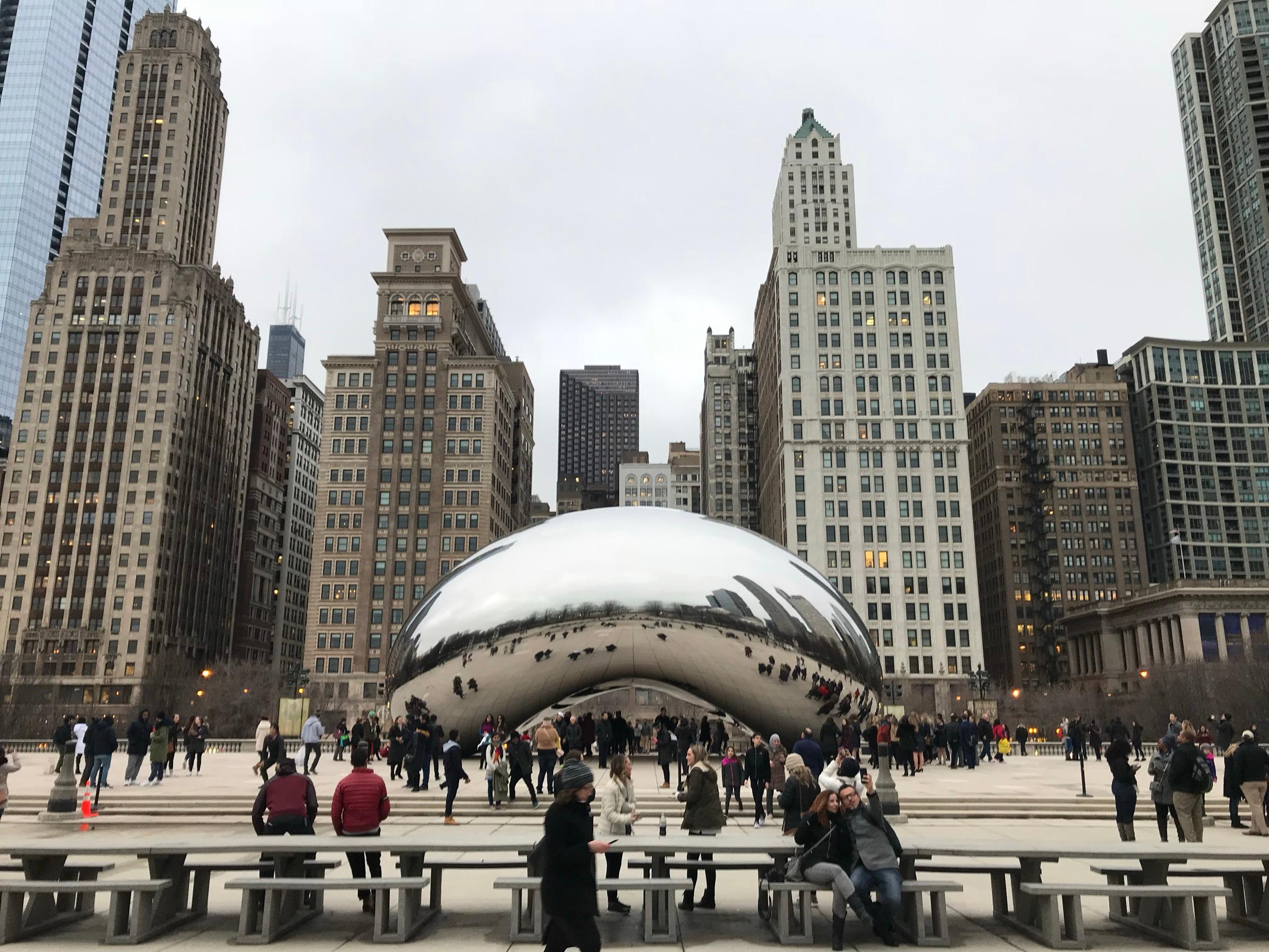 Cloud Gate in Millennium Park, reflecting the towers along Michigan Avenue on a grey February afternoon