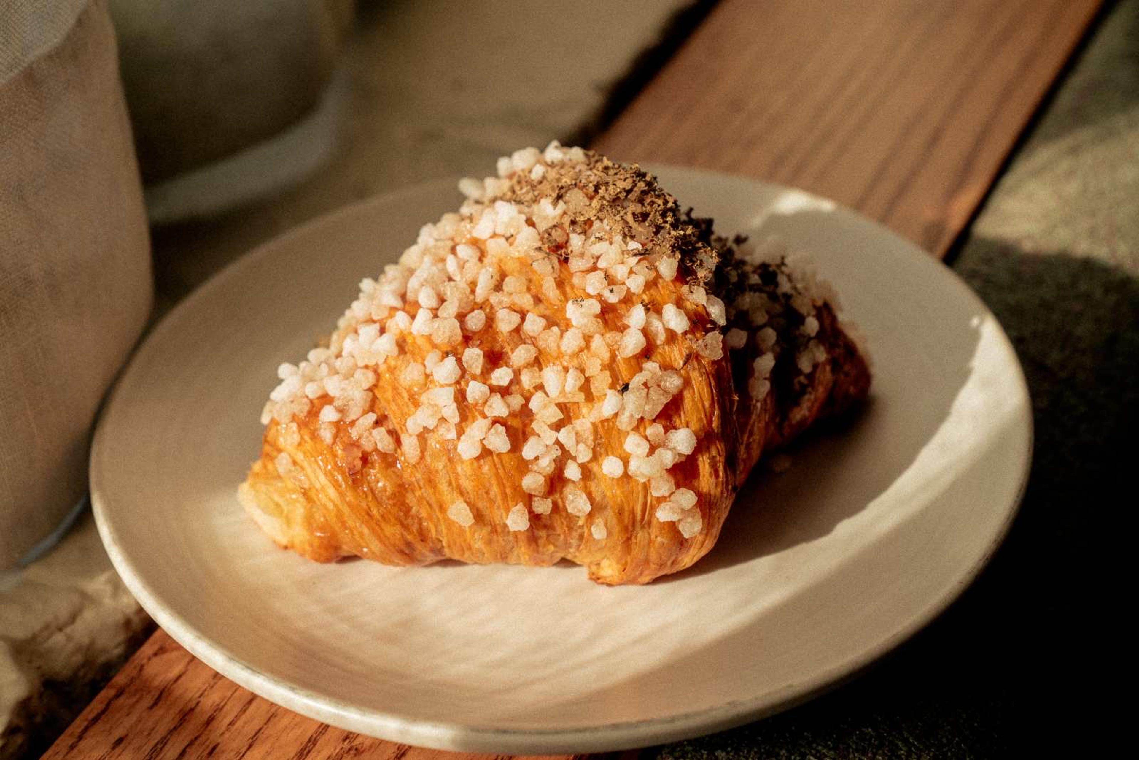 A pastry from Kasama's bakery counter, topped with pearl sugar