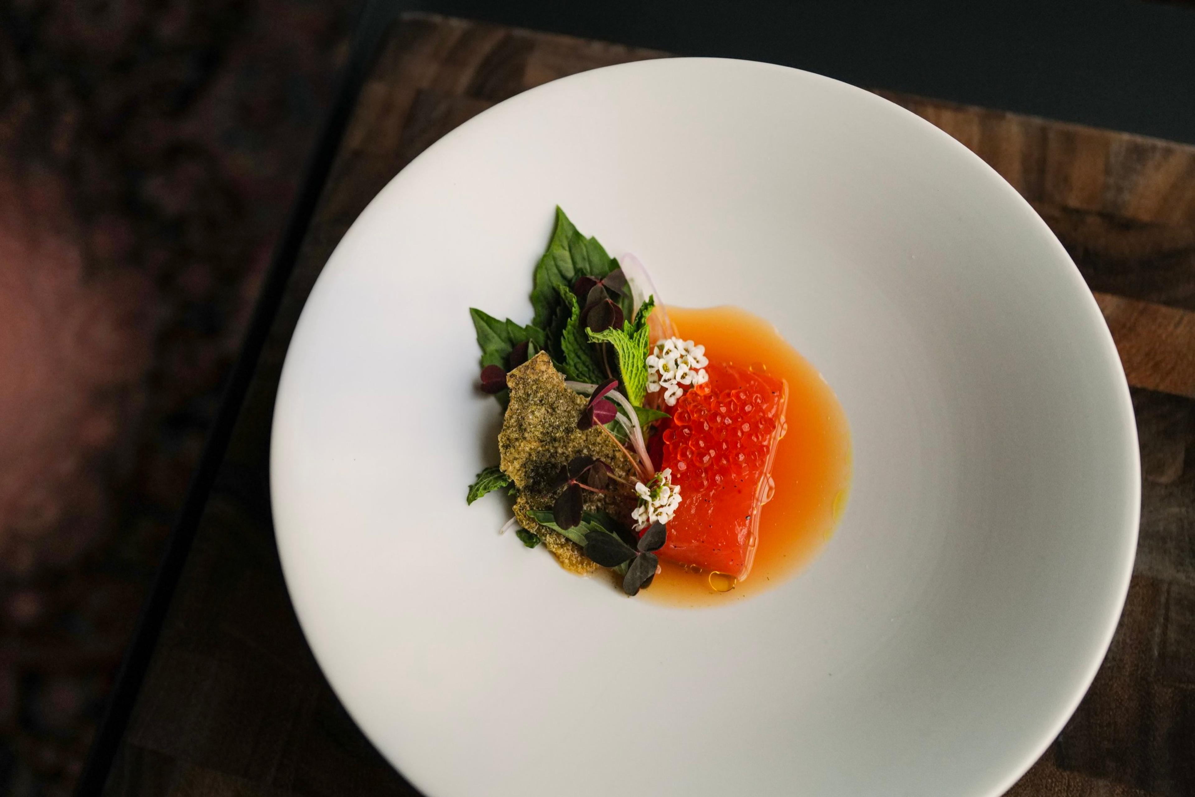 A course at Oriole on a white plate