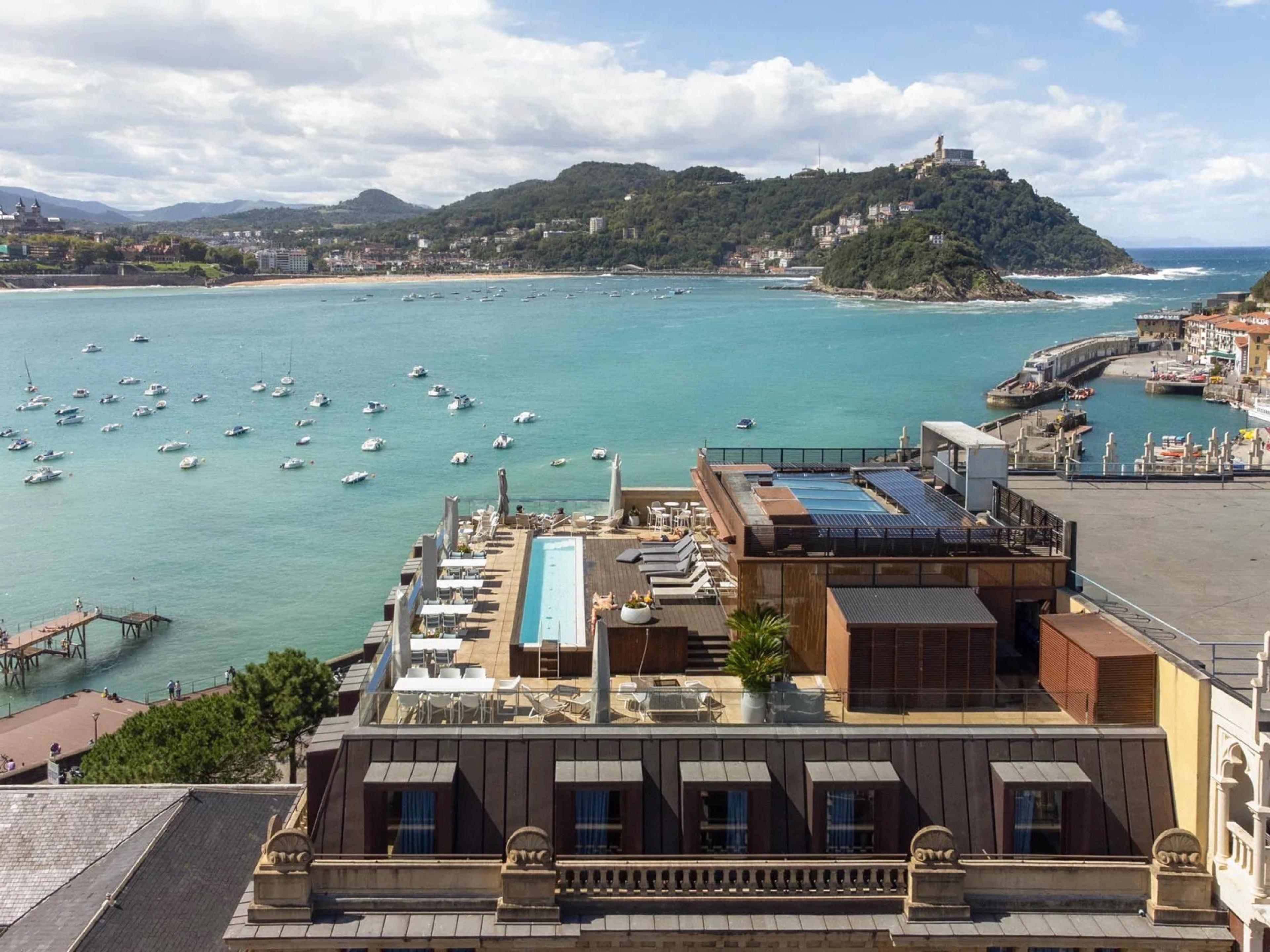 La Concha bay from the roof of Lasala Plaza in the Old Town, boats moored in the bay and Santa Clara island beyond