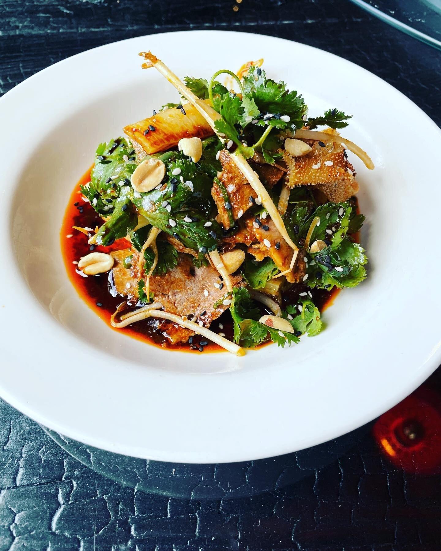 A plate of dressed greens and chilli at Hop Alley