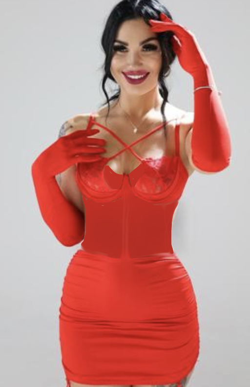 Polly London escort poses in a red dress with long red gloves Polly London escort poses in a red dress with long red gloves