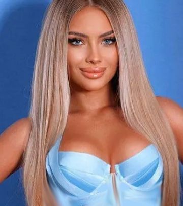 Alexandra wearing a light blue bodysuit Alexandra wearing a light blue bodysuit