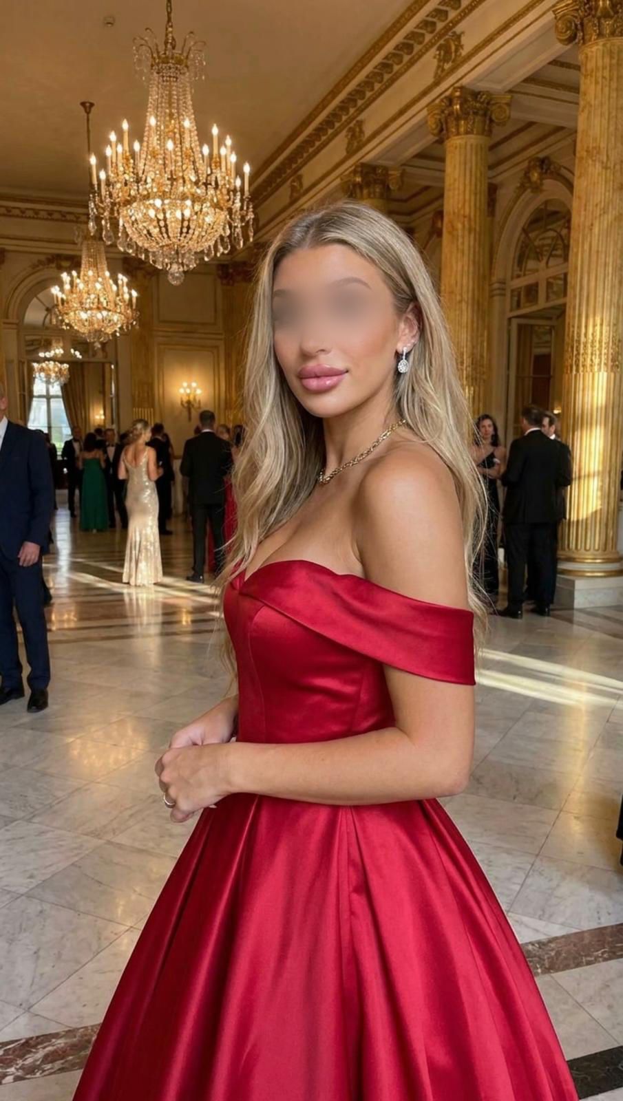 Celina wearing a red evening dress Celina wearing a red evening dress