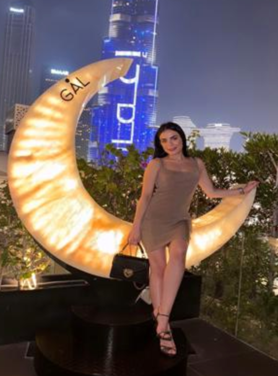 Bonnie Brunette European poses siting on a moon Bonnie Brunette European poses siting on a moon