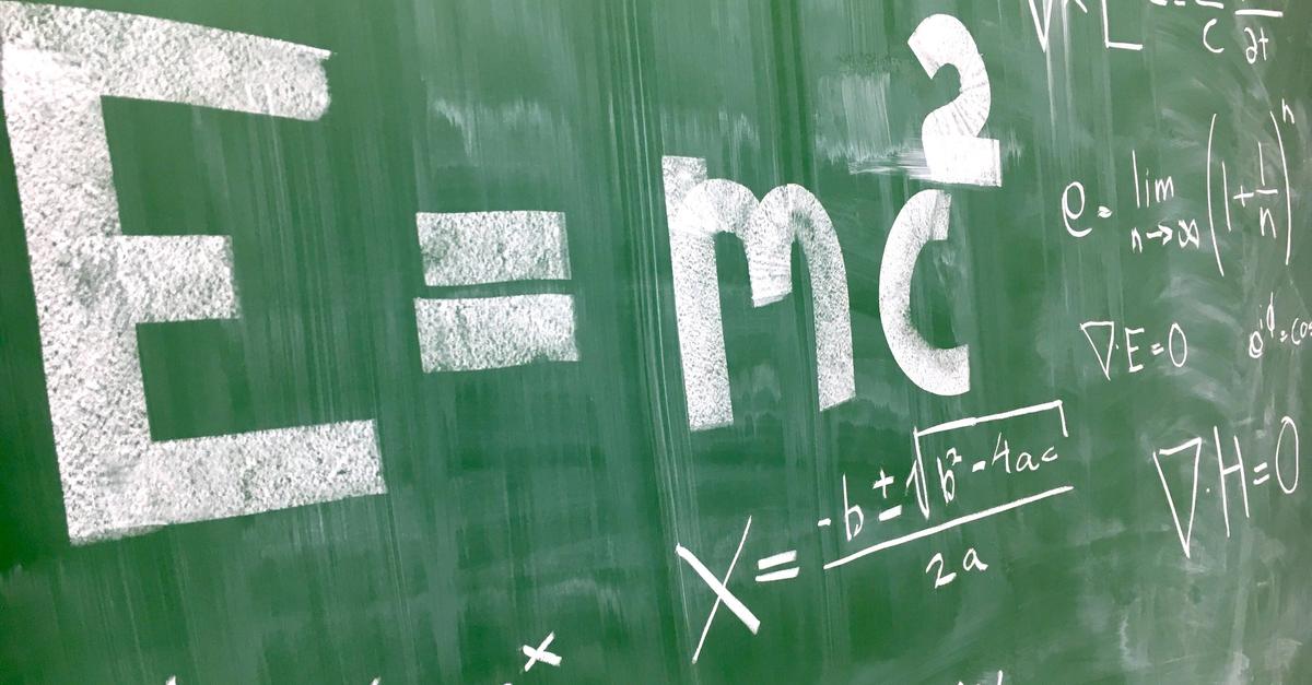 E = MC squared on chalkboard.