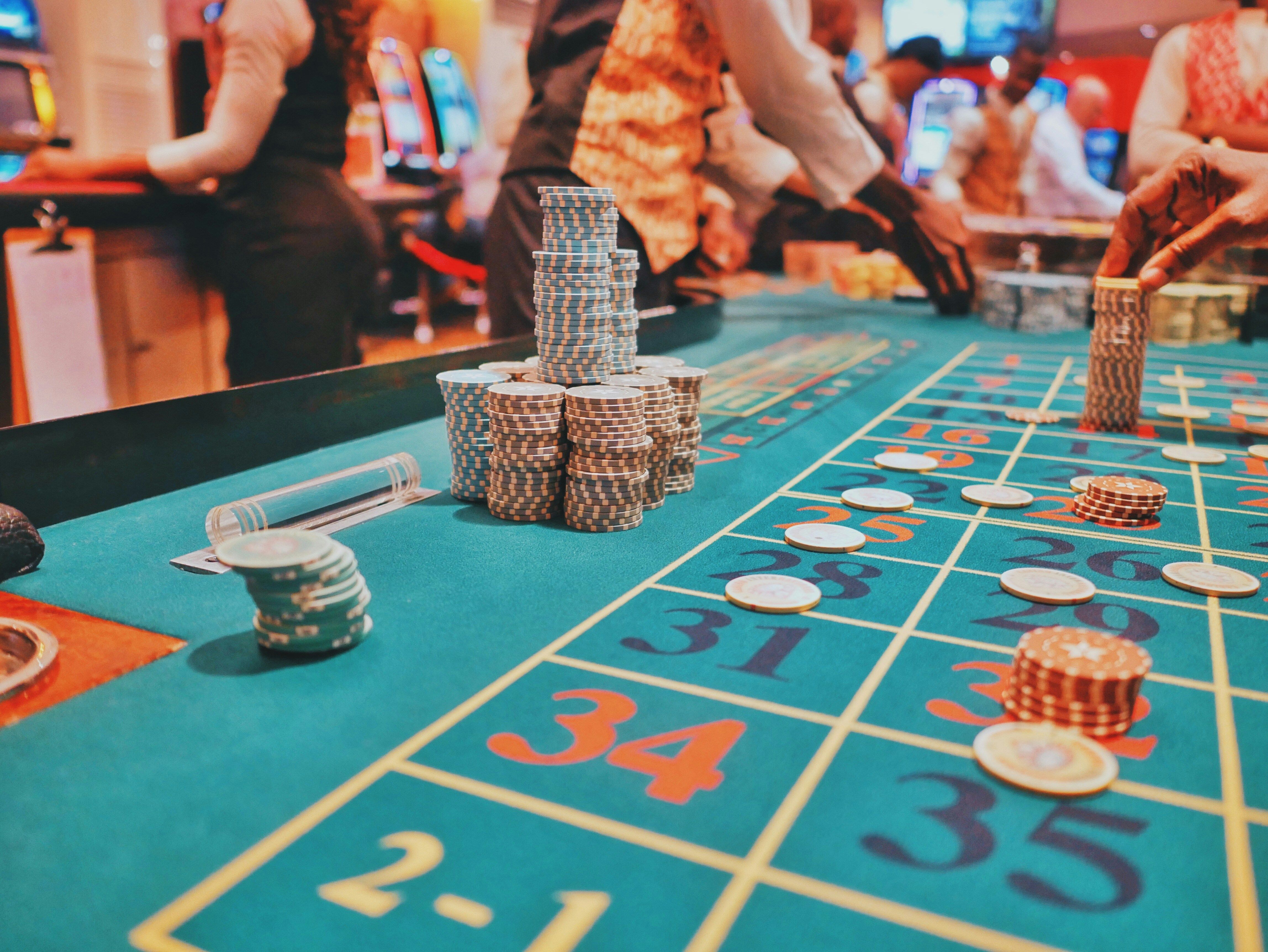 Gambling in casino at dice table by Kaysha.