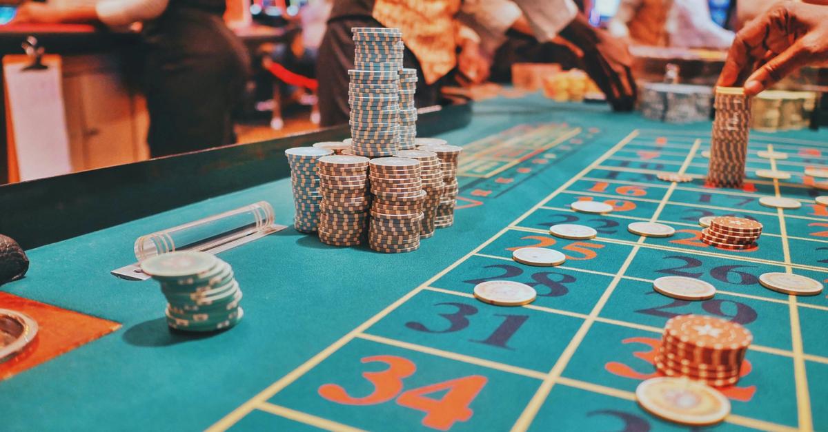 Gambling in casino at dice table by Kaysha.