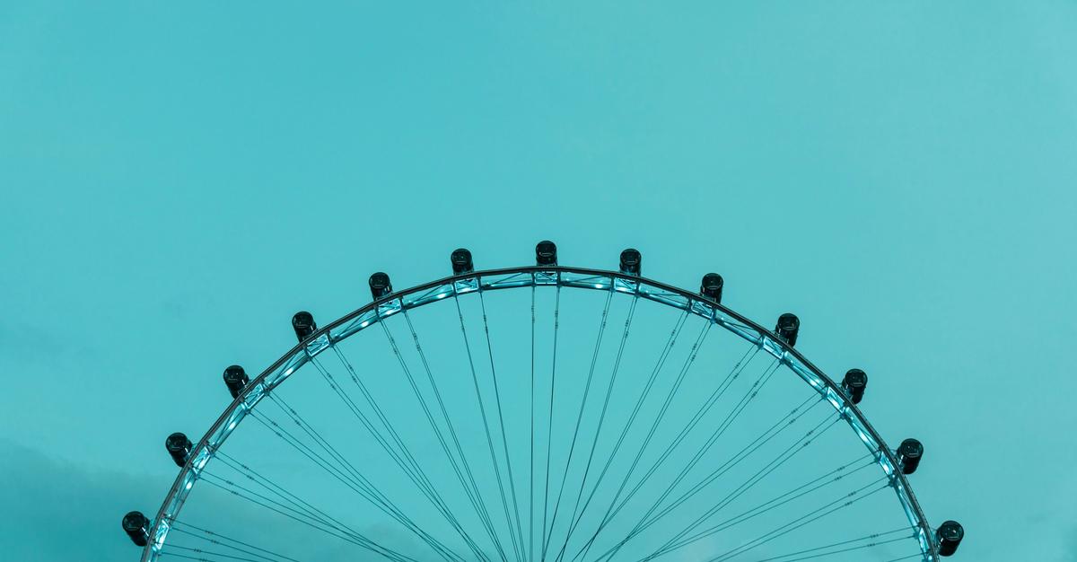 Side perspective of a Ferris Wheel.