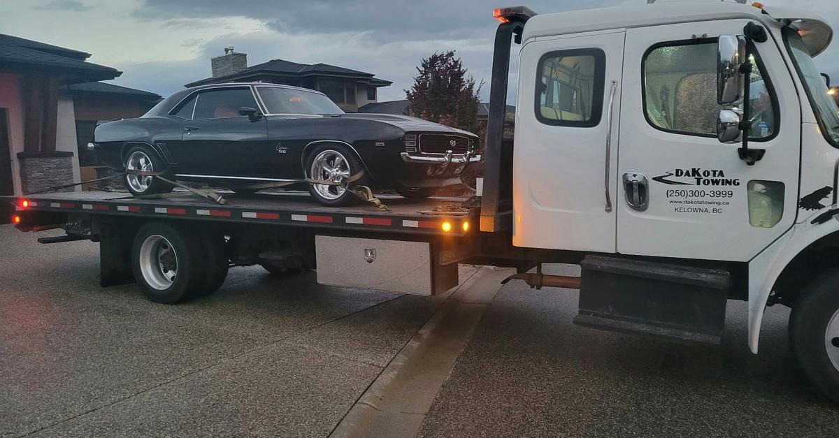 Car being towed and repossessed by Dakota Towing inc.