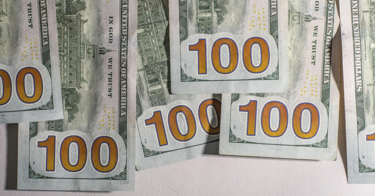 Backside of hundred dollar bills.