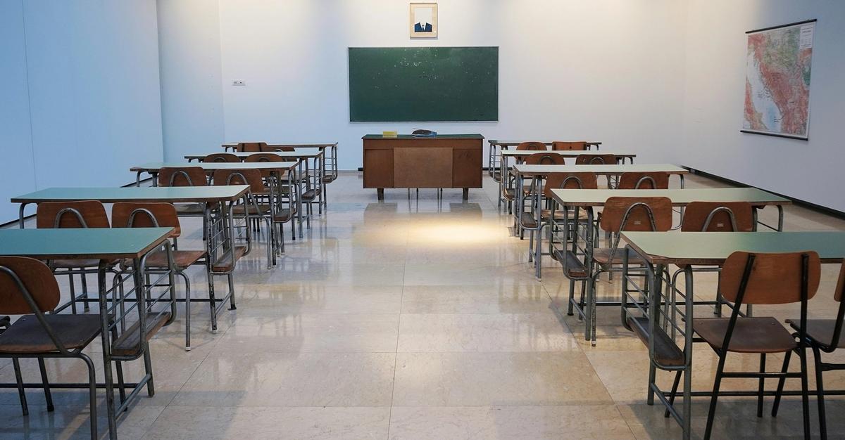 Empty classroom by Ivan Aleksic.