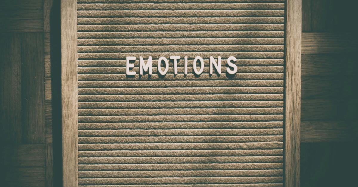 Sign post with word "Emotions" written on it by Alexas Fotos.