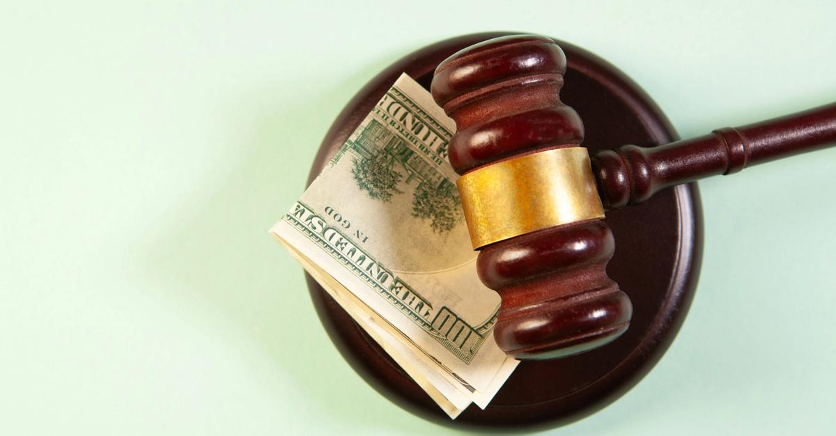 Money next to a gavel by sasun bughdaryan.