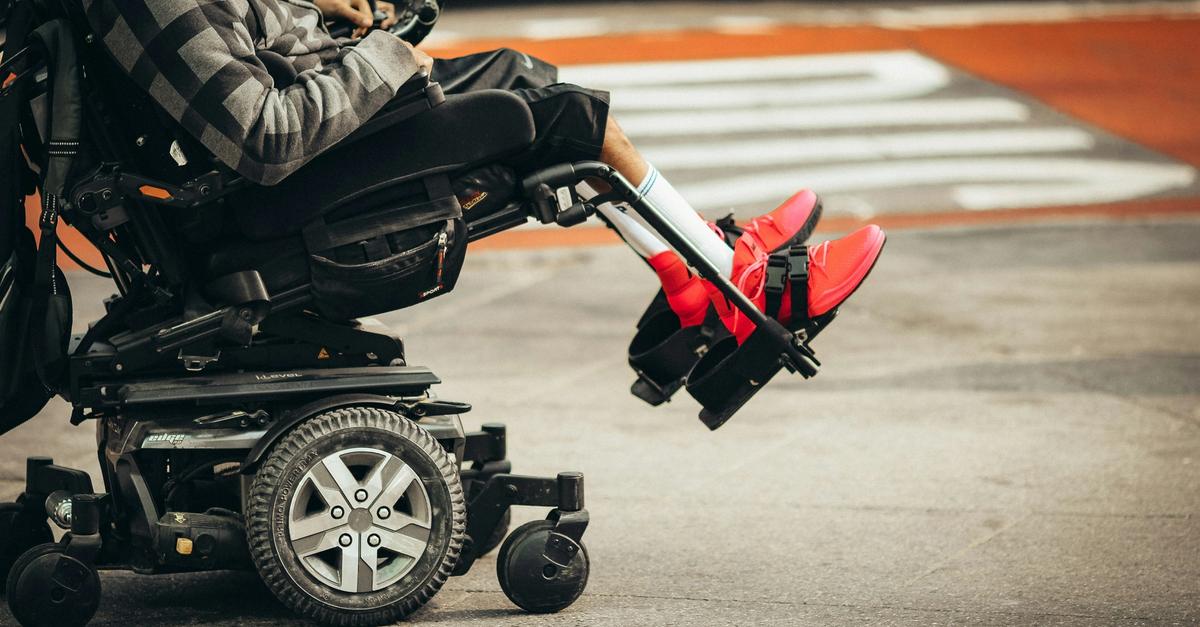 Special needs person in wheelchair by Jon Tyson.