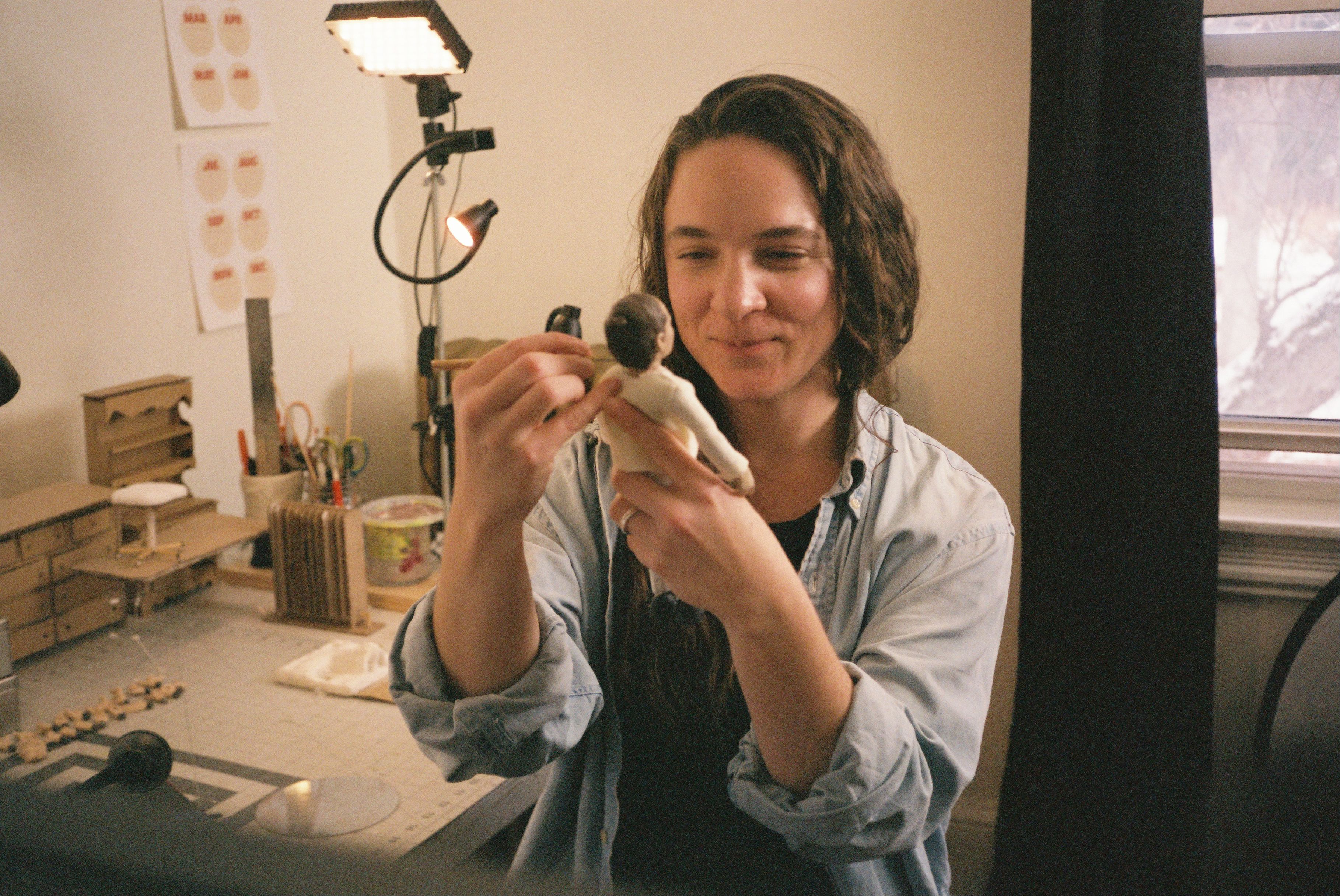 Hannah Darrah busy at work making her clay models
