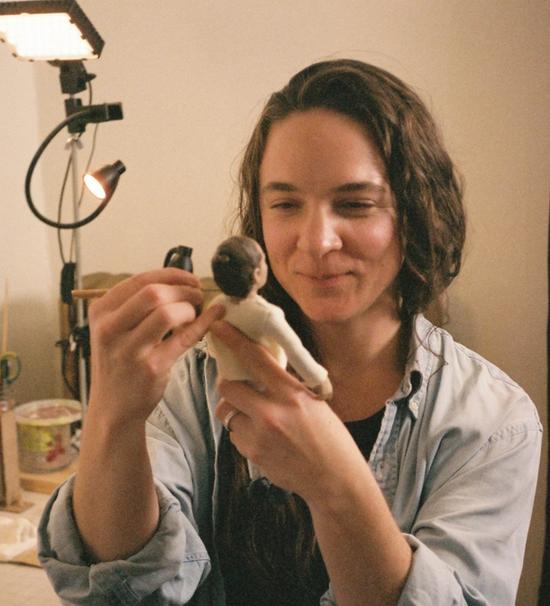 Hannah Darrah busy at work making her clay models