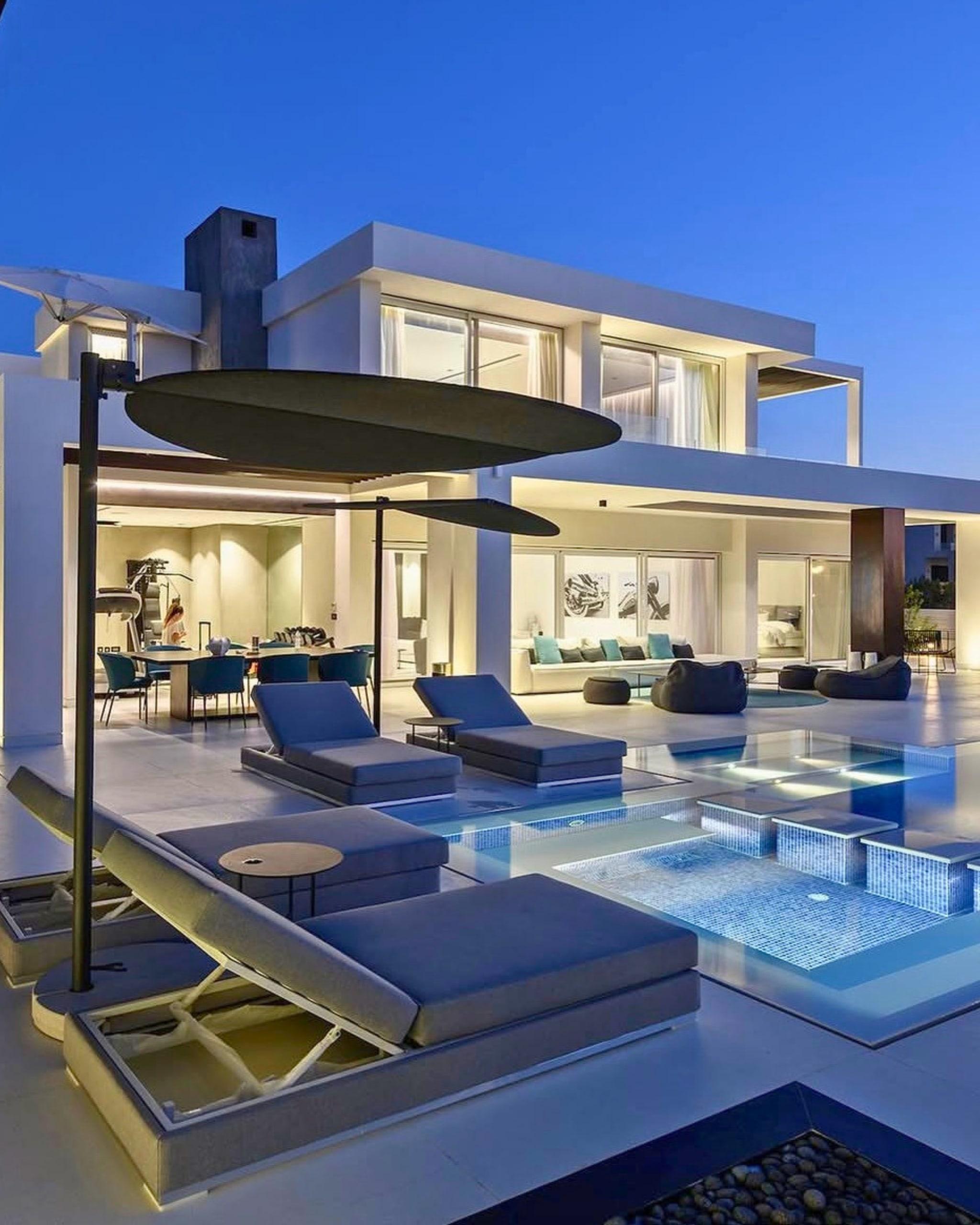 A contemporary villa and pool at dusk on Egypt’s North Coast