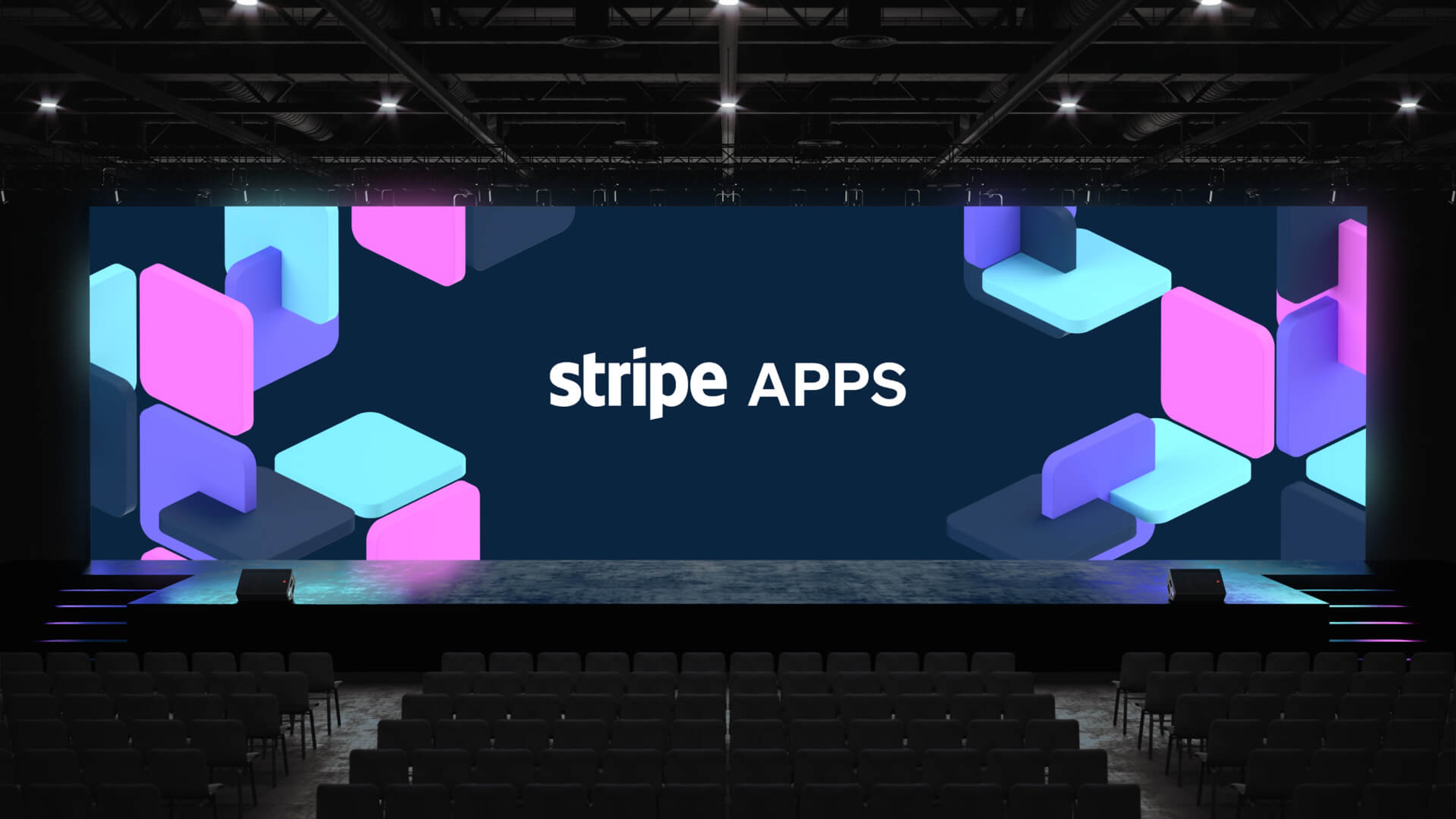 A mockup of a conference stage with a dark Stripe Apps backdrop