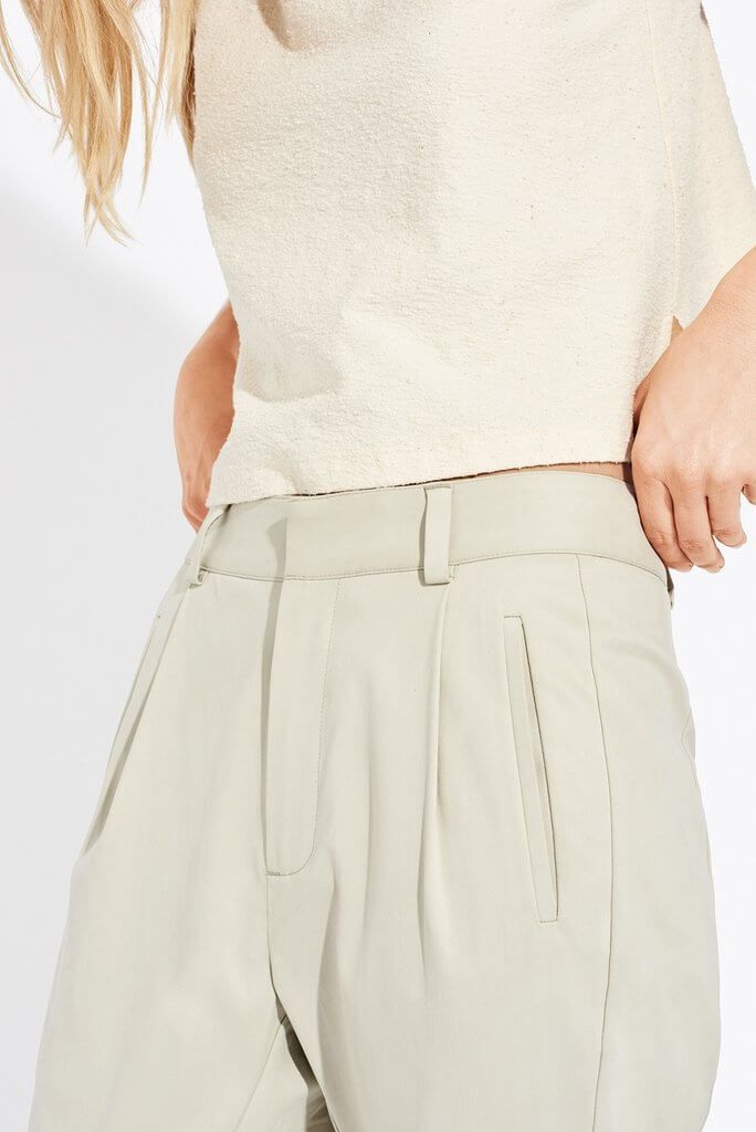 Cover for AYR showing a detailed view of beige clothing