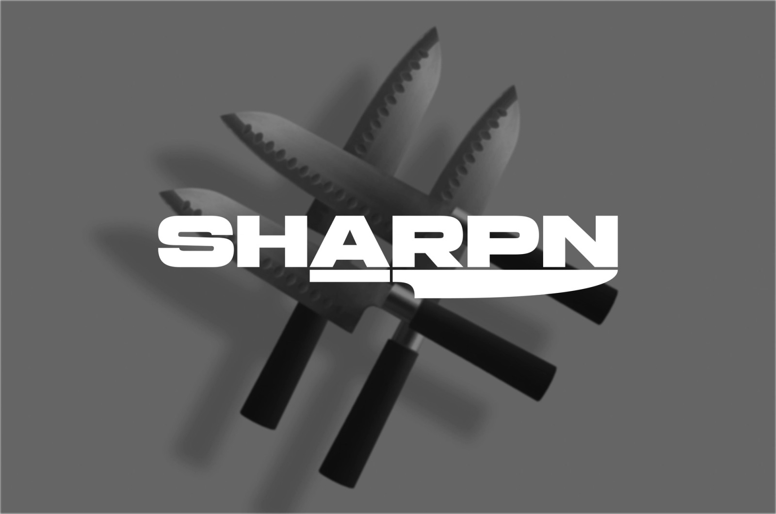 The Sharpn logotype over a spread of kitchen knives