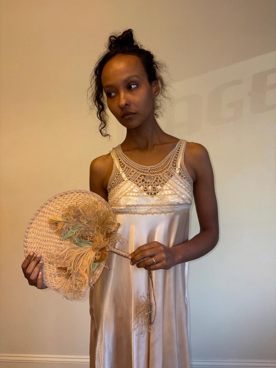 Antique Woven Straw Fan With Exquisite Feather Adornment  product image
