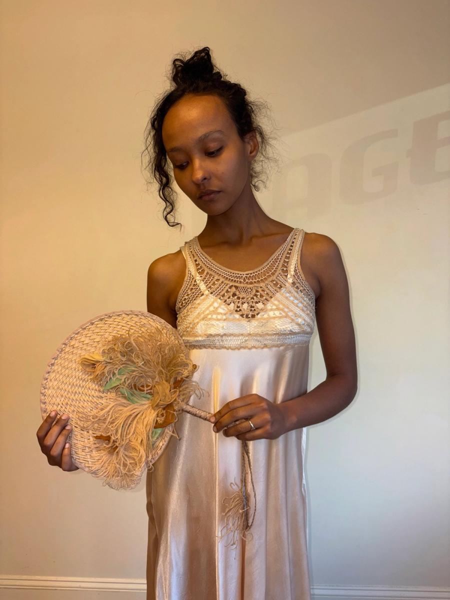 Antique Woven Straw Fan With Exquisite Feather Adornment  product image