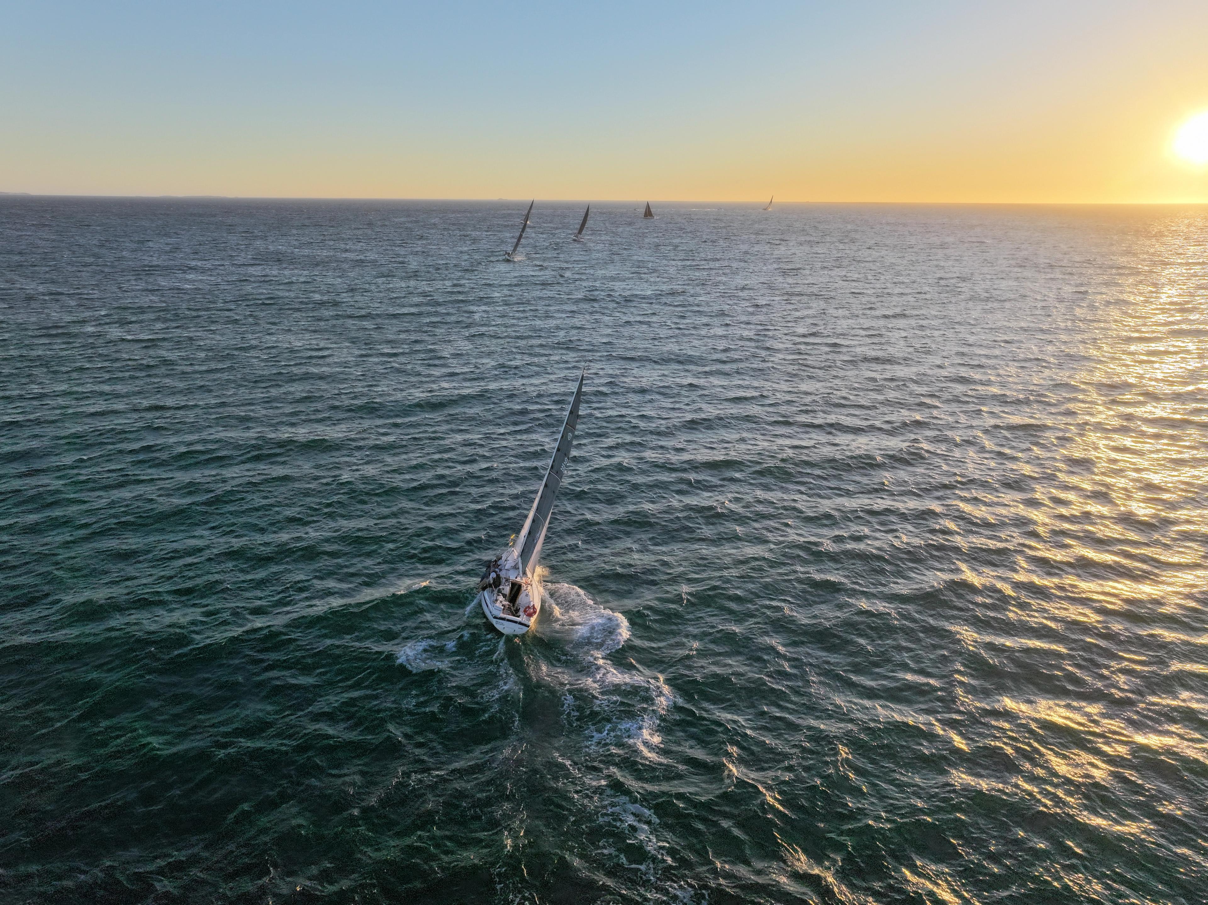 Yachts race towards the horizon