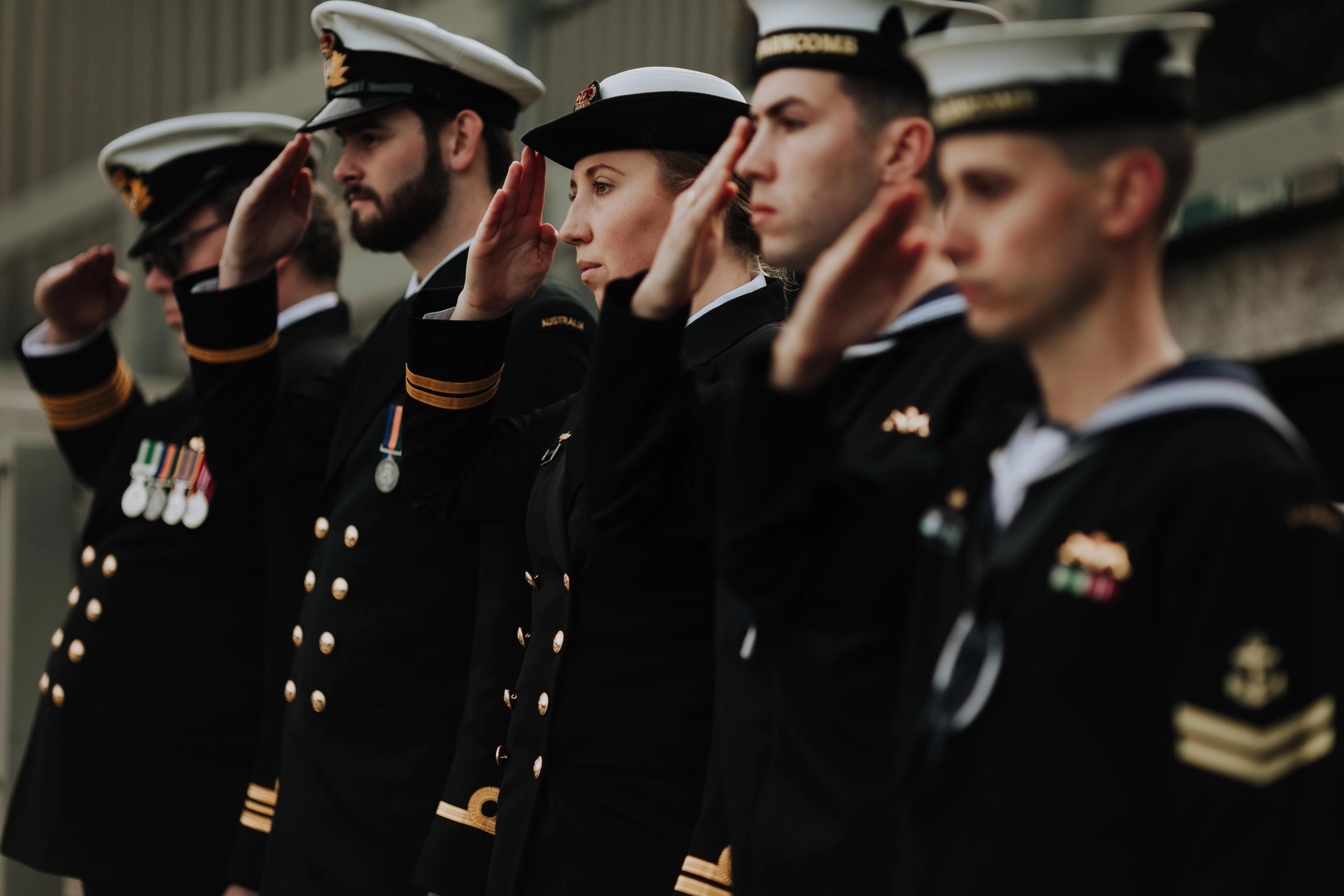 Submariners saluting