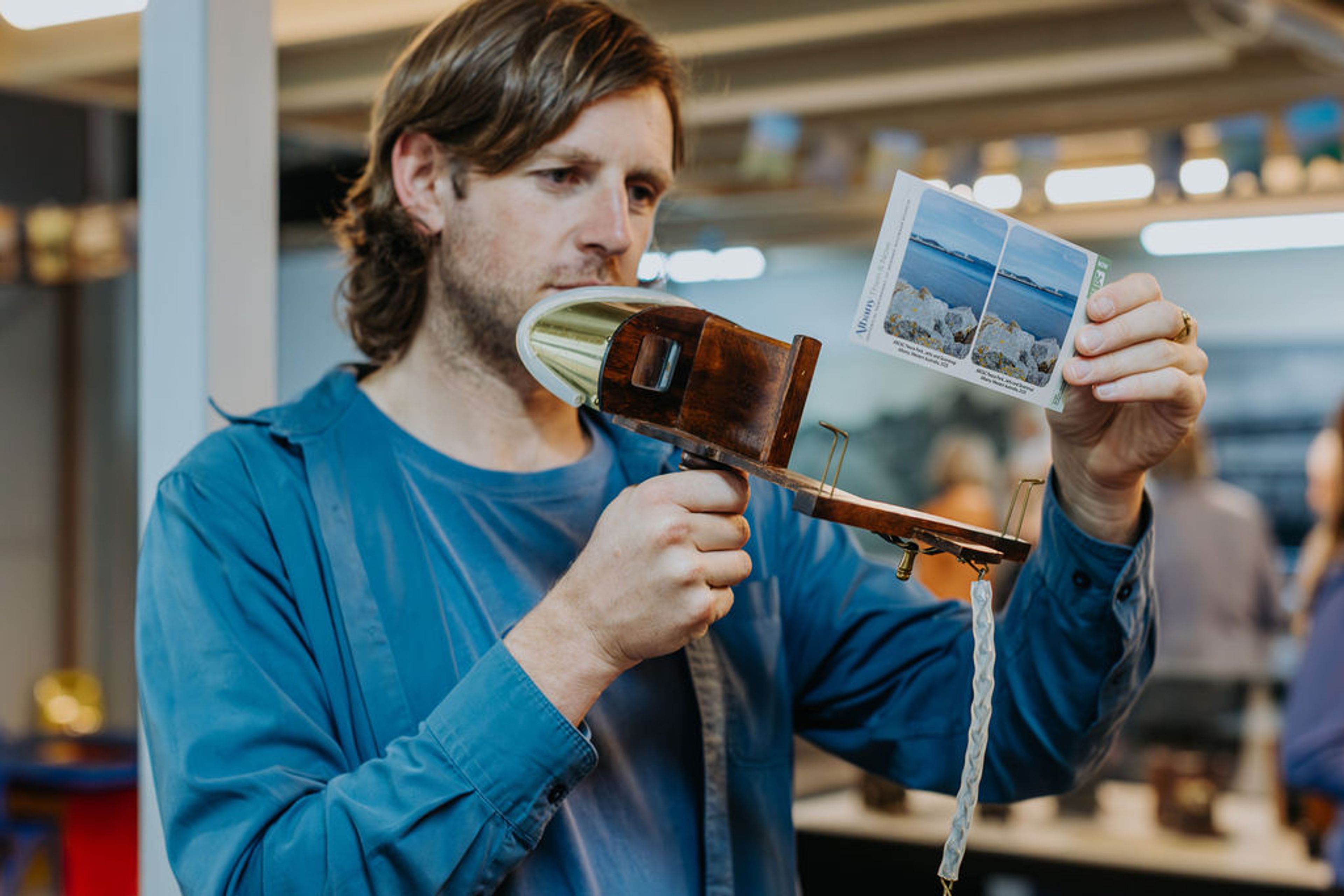 A man looks at historic images