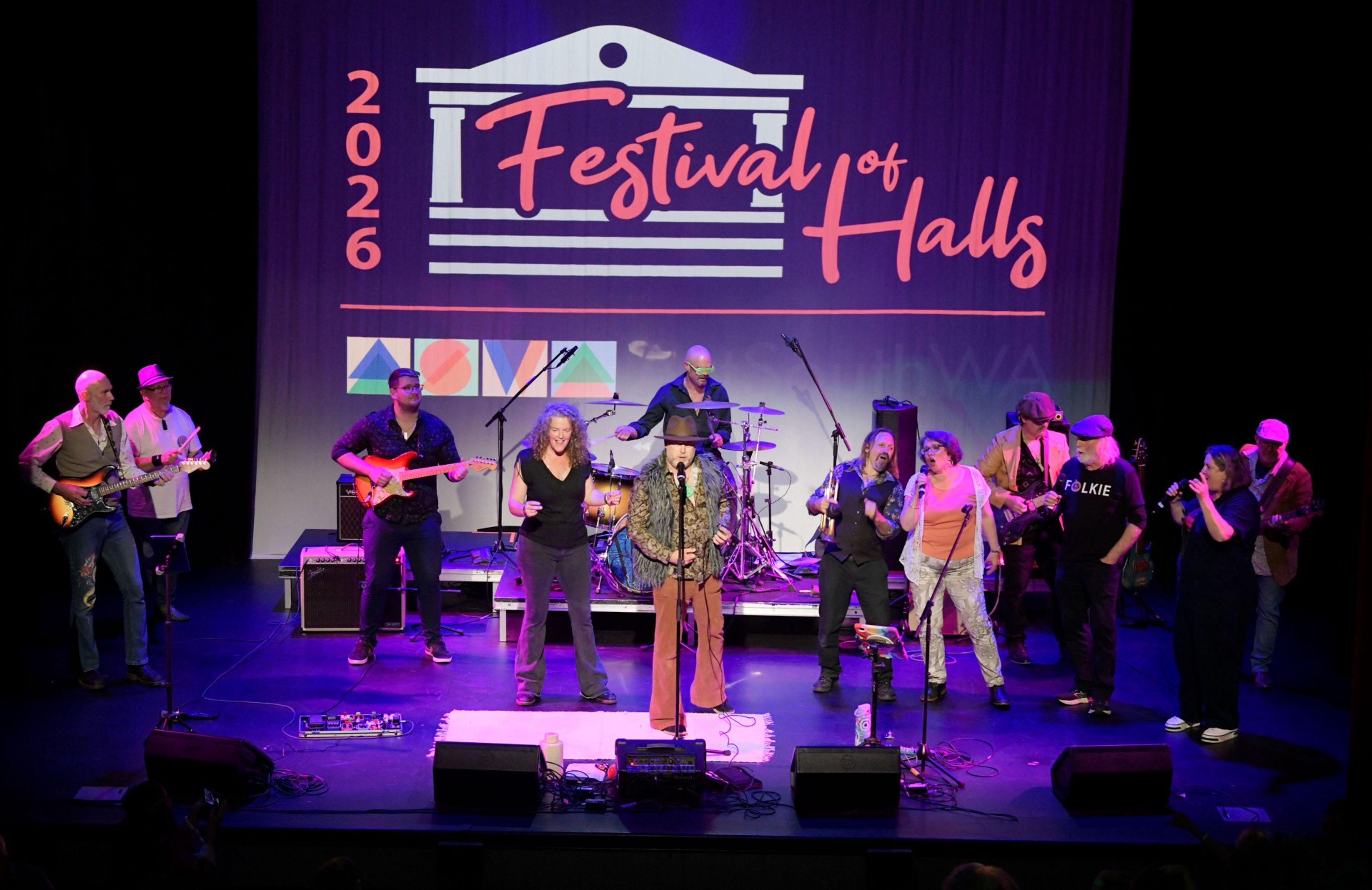 A live band on the Town Hall stage at Wholly Local Festival