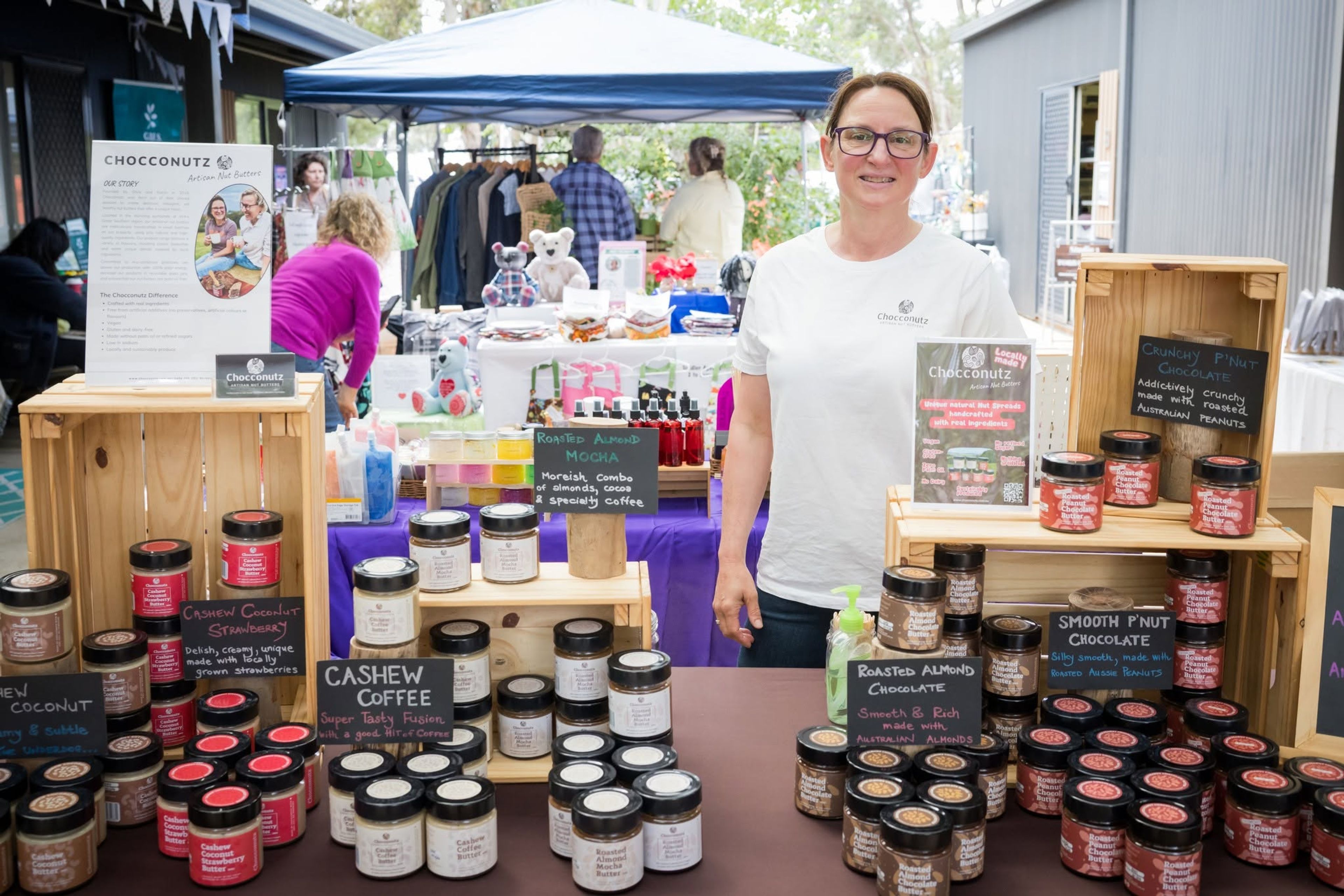 A stallholder displaying her wares