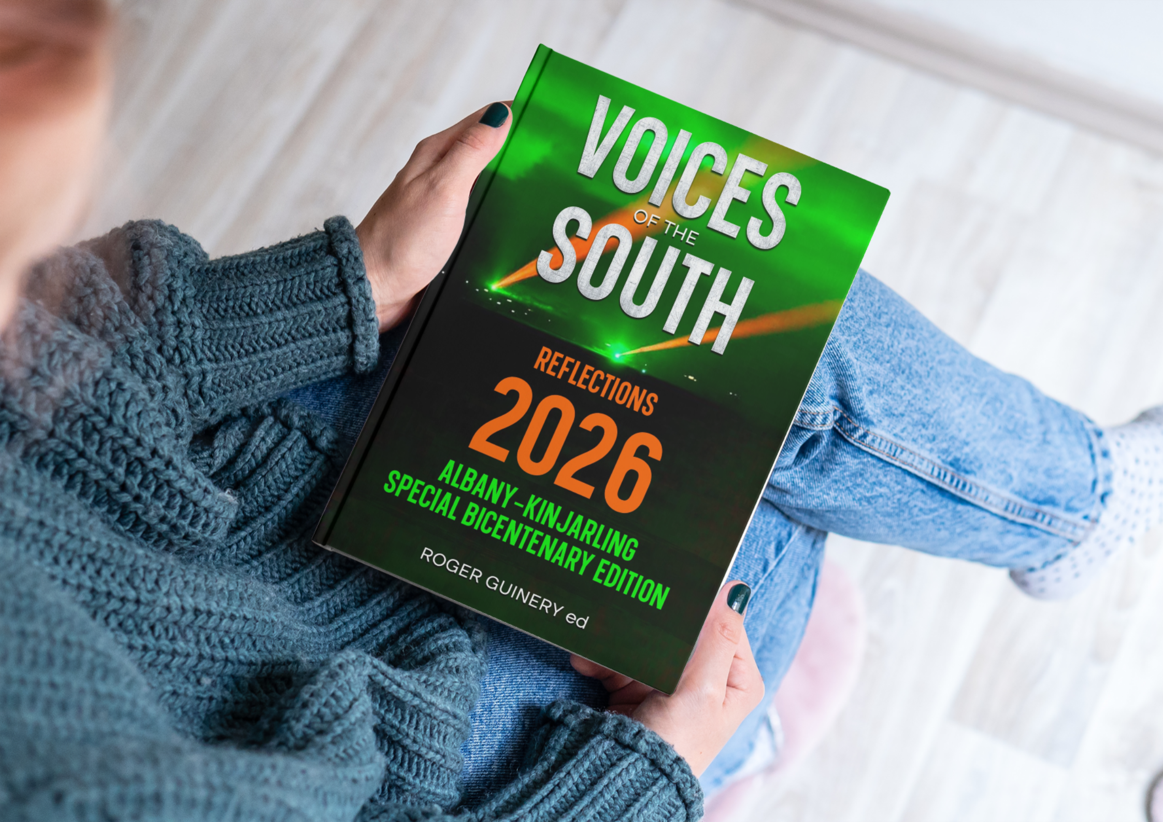 A copy of Voices of the South is held in a persons hands